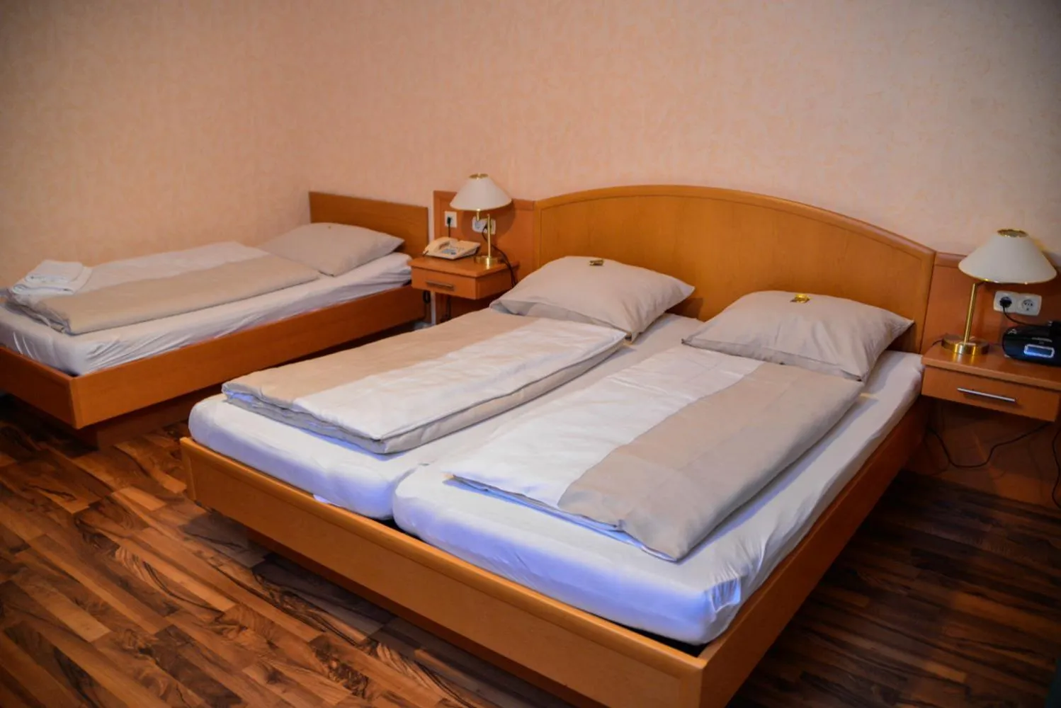 Bed in Flair Hotel Grüner Baum