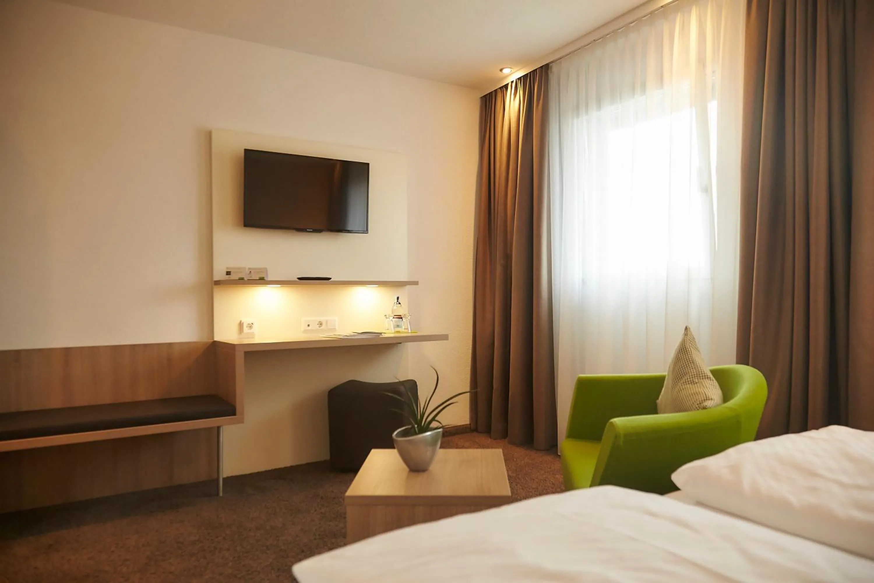 Photo of the whole room, Bed in Flair Hotel Grüner Baum