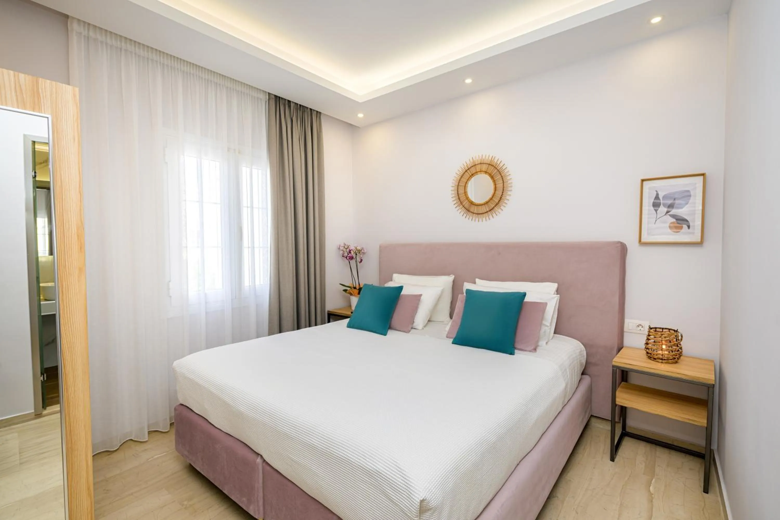 Bed in KORINA APART HOTEL KAVOS