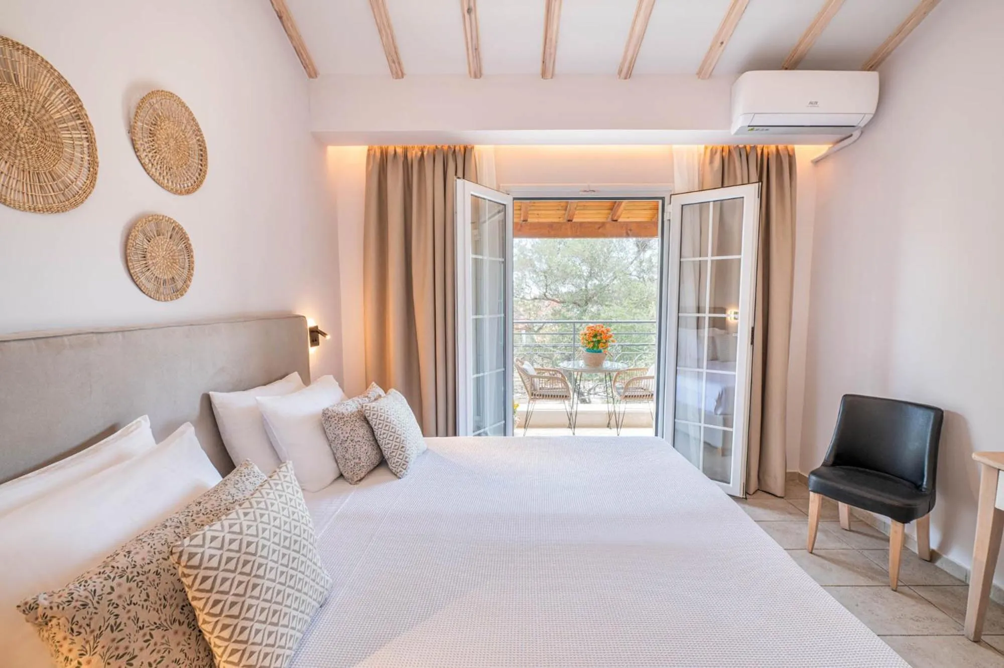 Bed in KORINA APART HOTEL KAVOS