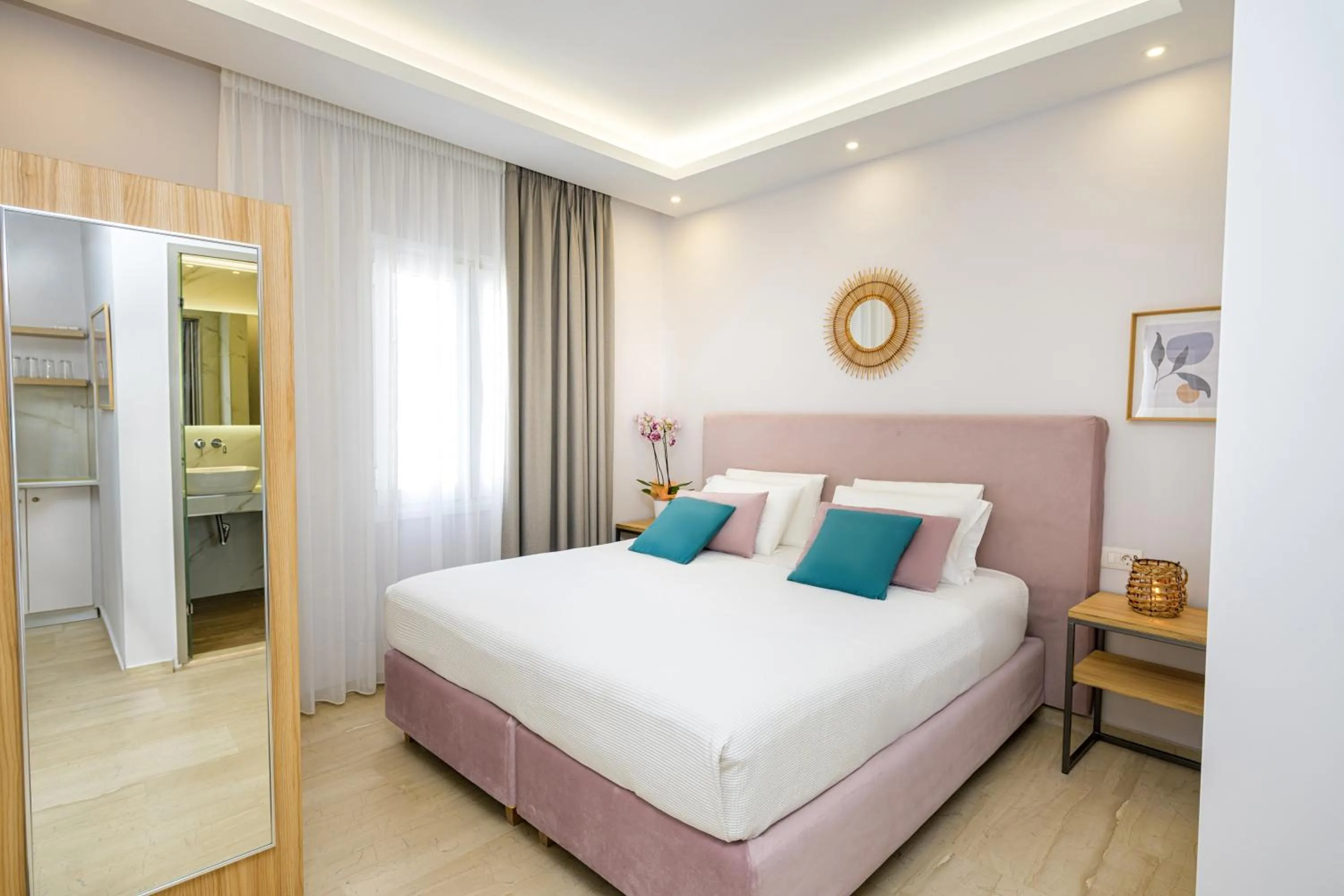 Bed in KORINA APART HOTEL KAVOS