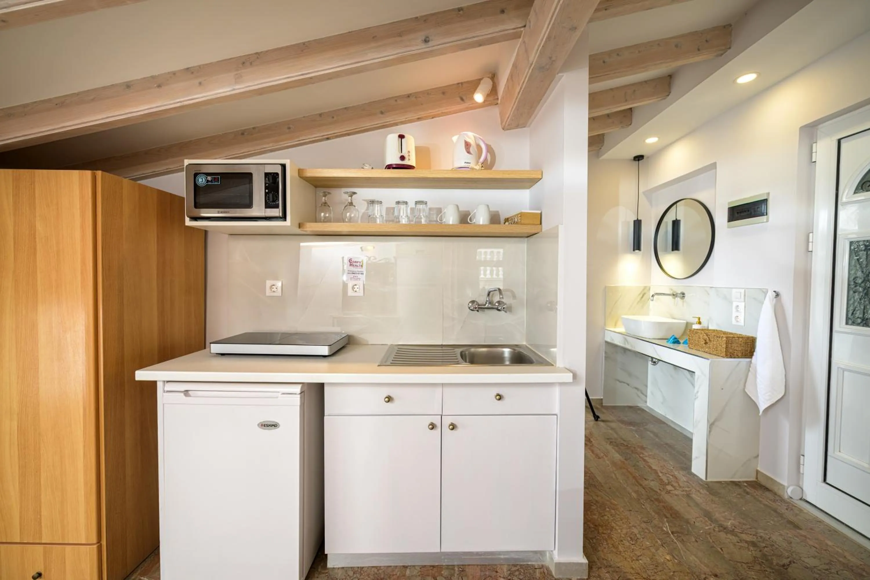 Kitchen or kitchenette in KORINA APART HOTEL KAVOS