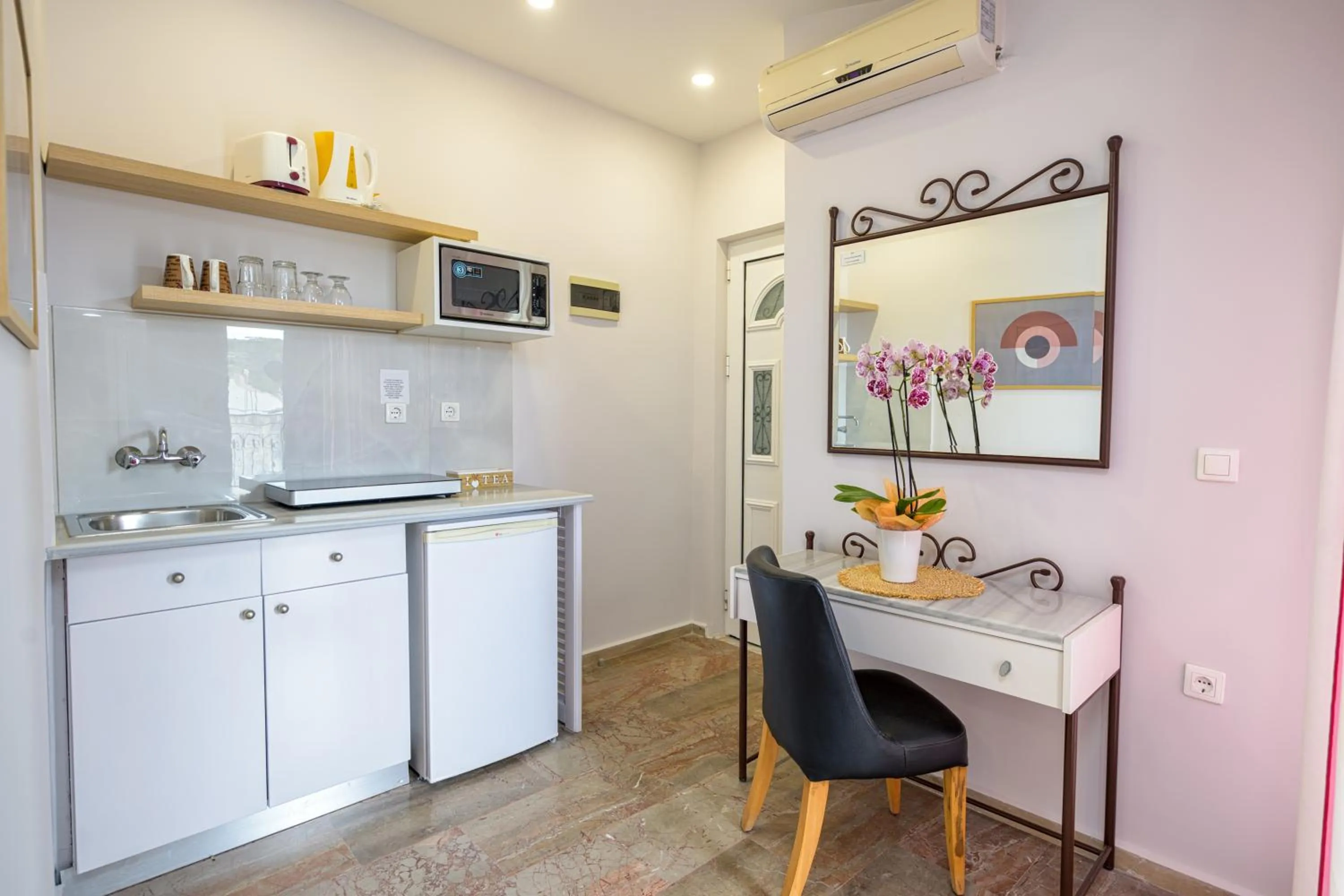 Kitchen or kitchenette in KORINA APART HOTEL KAVOS