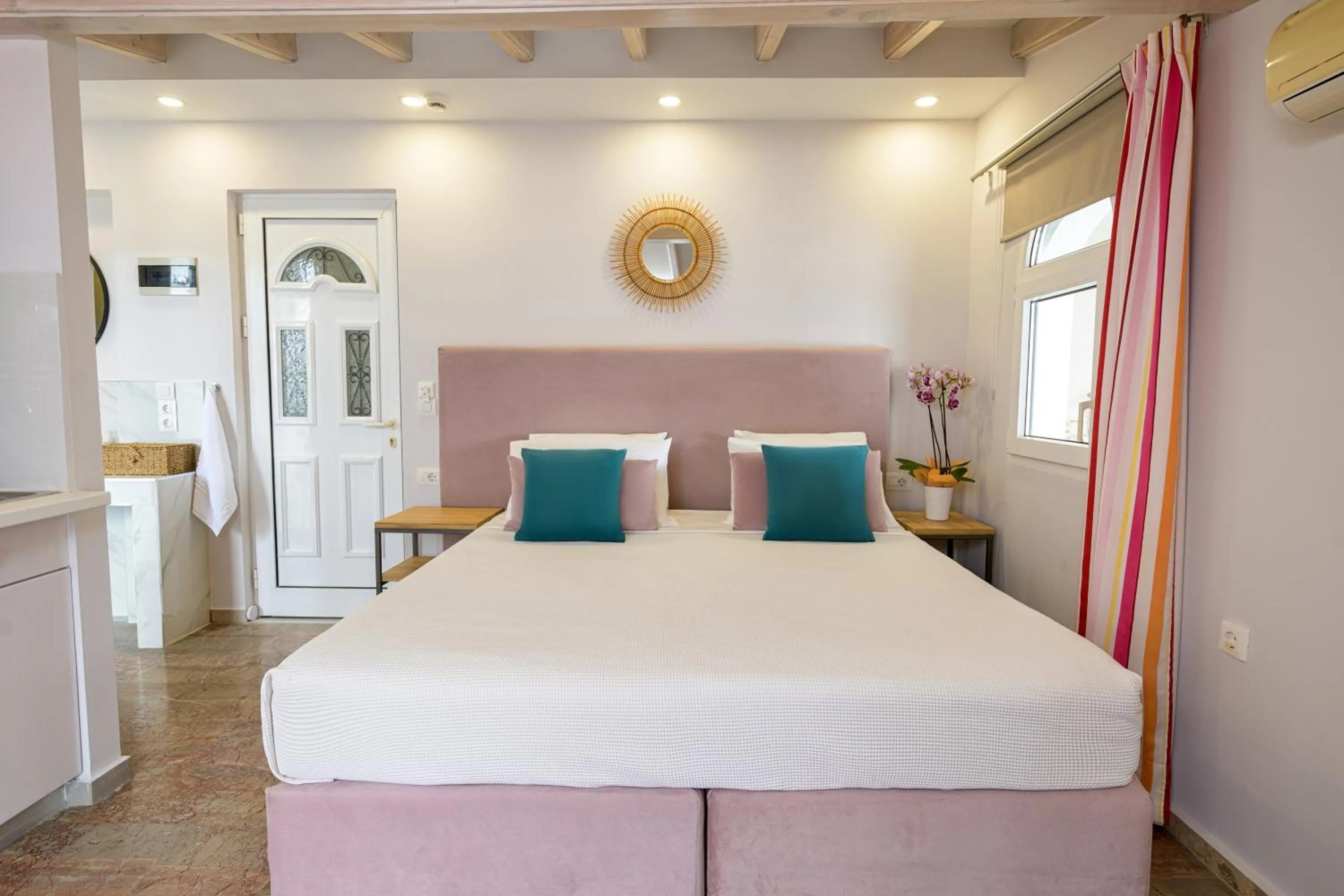 Bed in KORINA APART HOTEL KAVOS