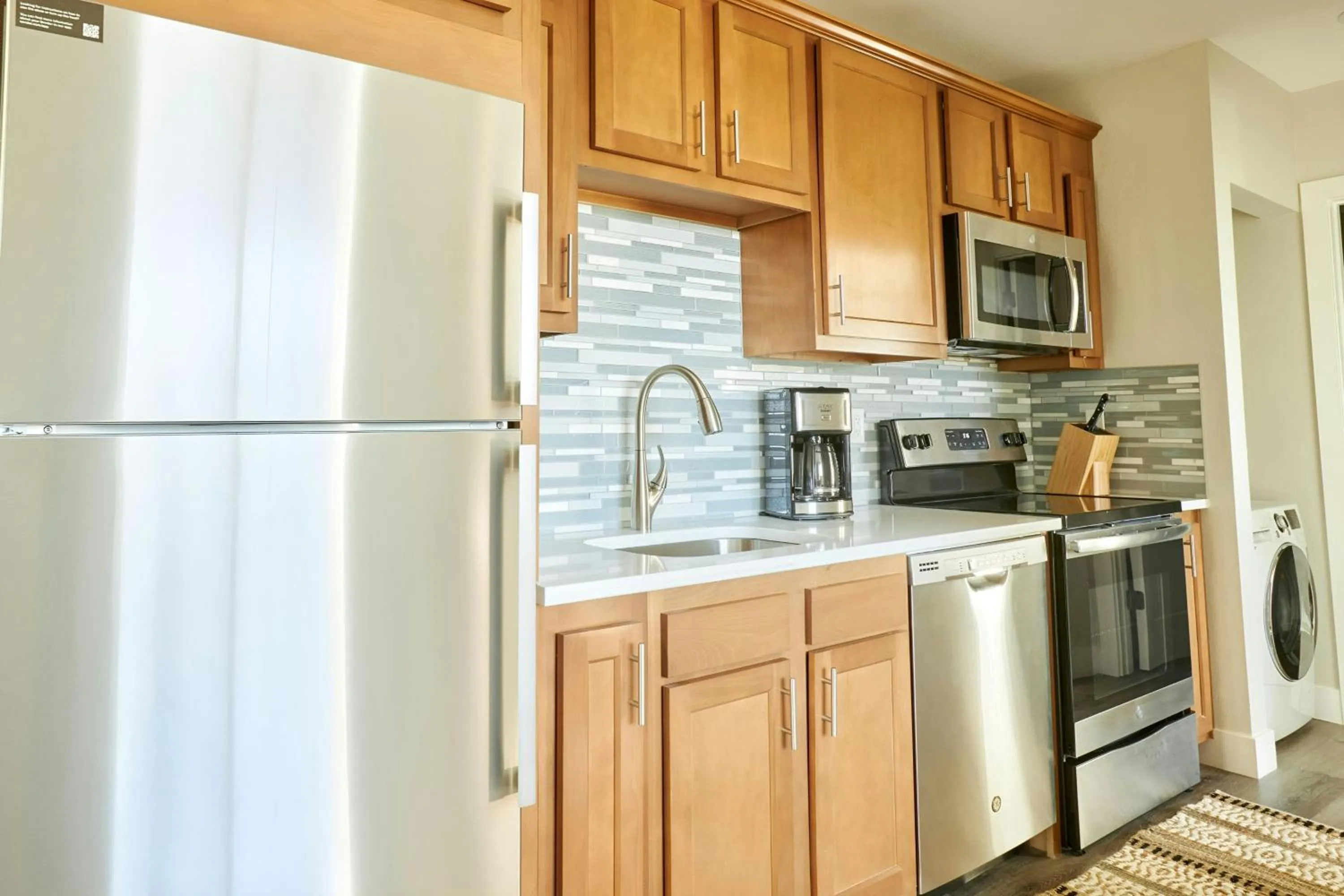 Kitchen or kitchenette in Sonder by Marriott Bonvoy Osage Apartments LoHi