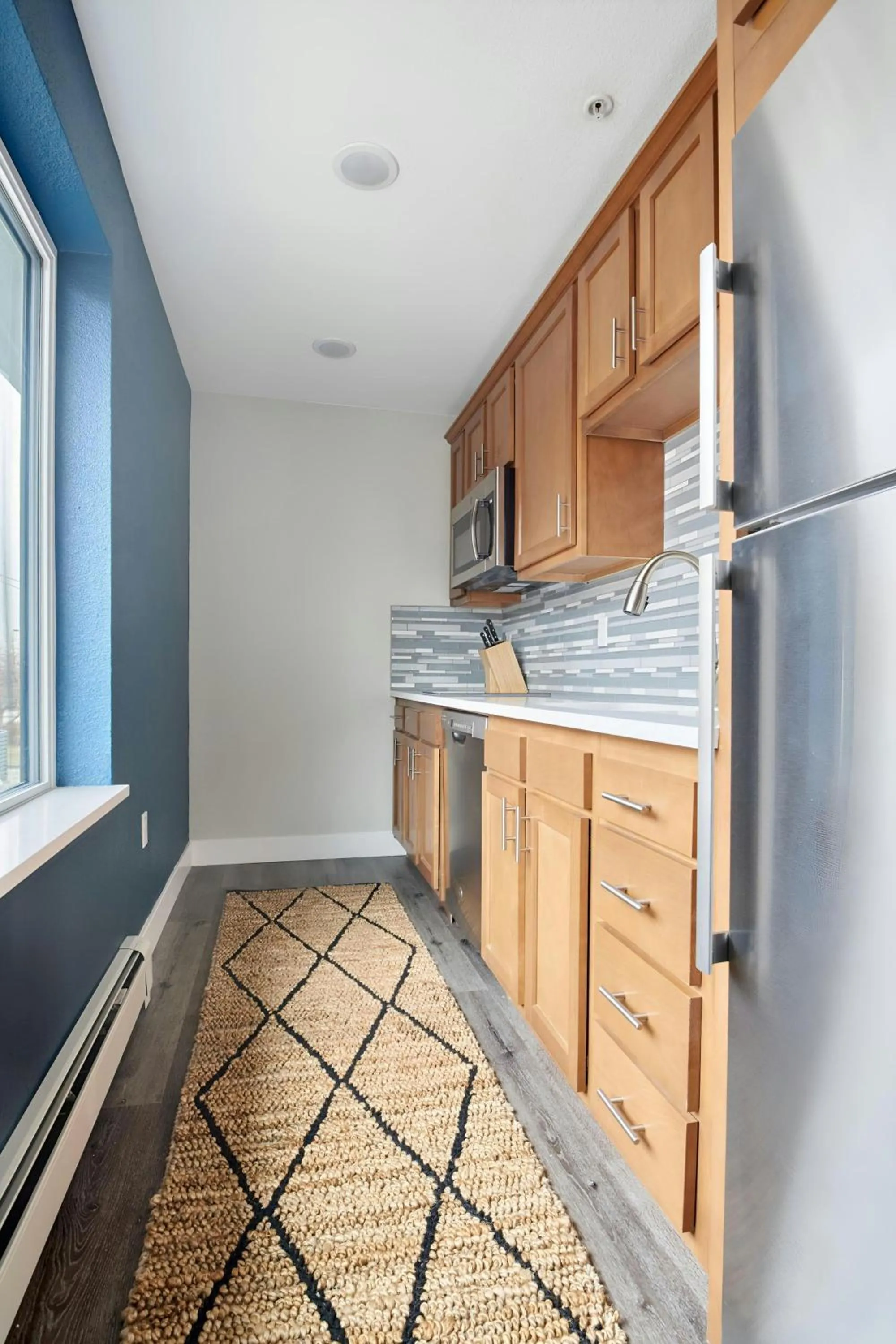 Kitchen or kitchenette in Sonder by Marriott Bonvoy Osage Apartments LoHi