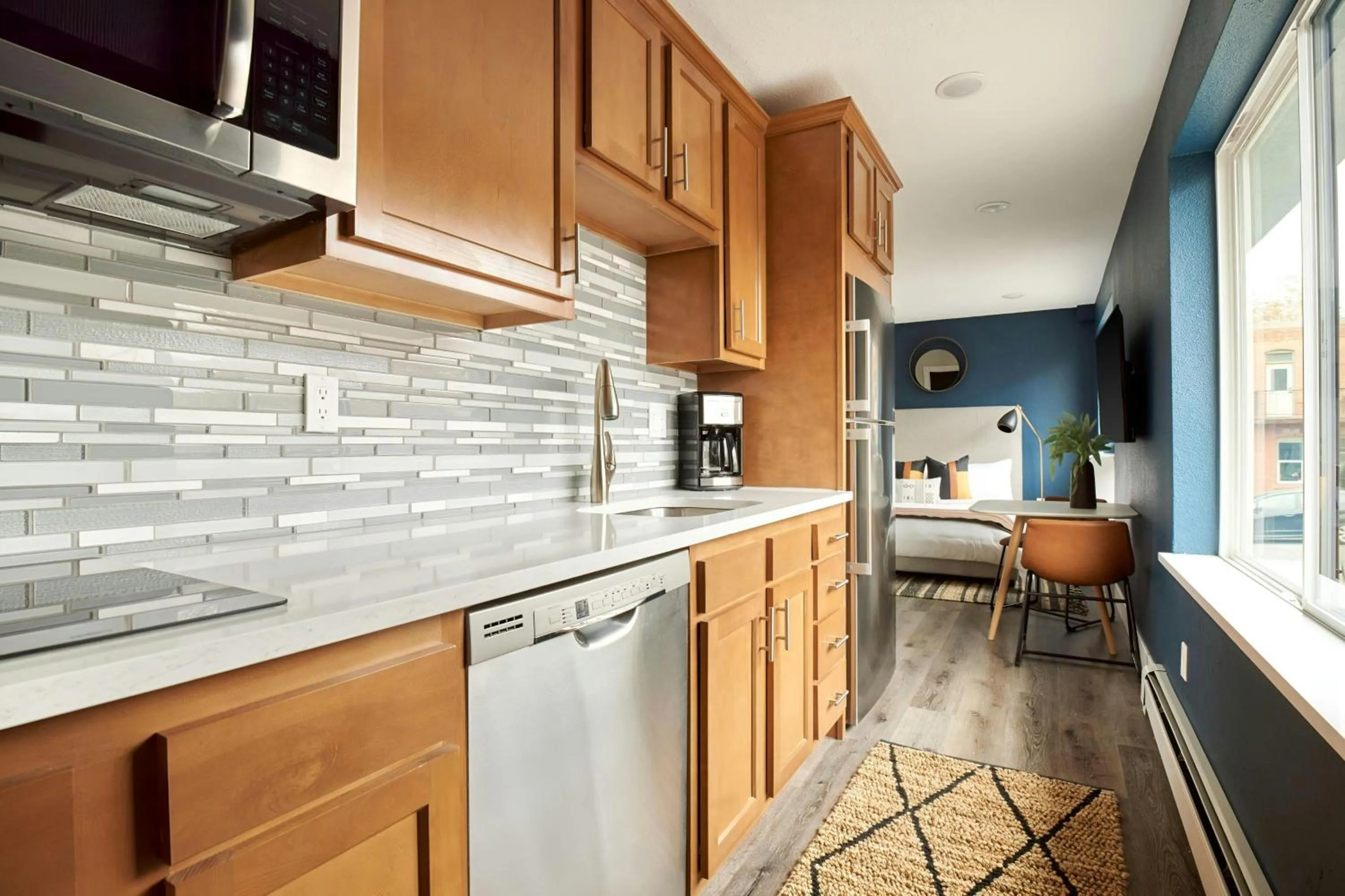 Kitchen or kitchenette in Sonder by Marriott Bonvoy Osage Apartments LoHi