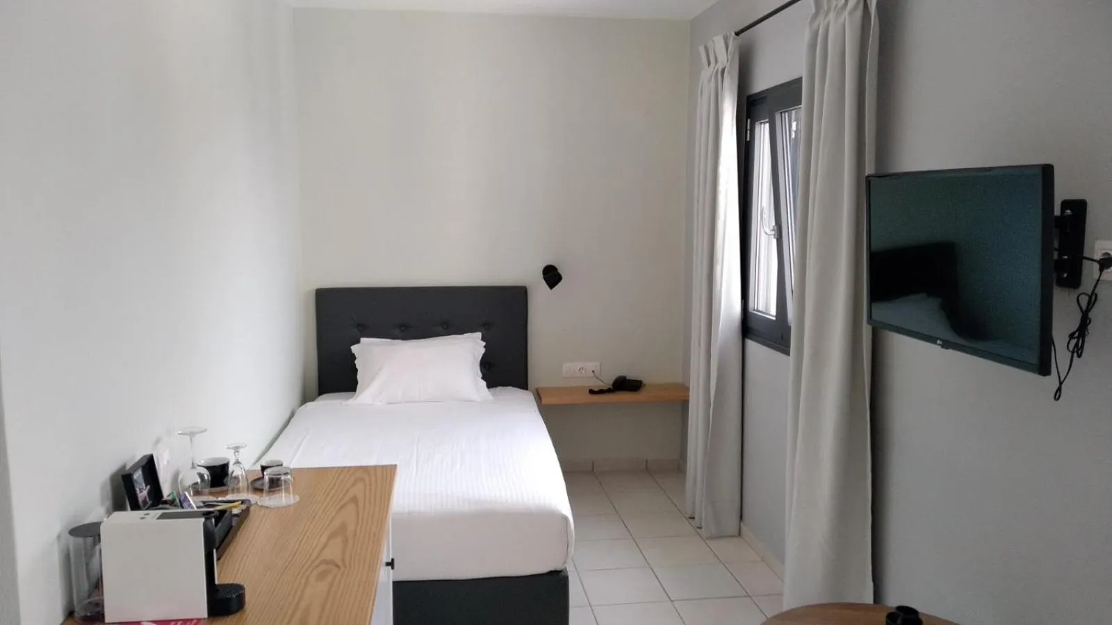 Bed in Minois Boutique Hotel