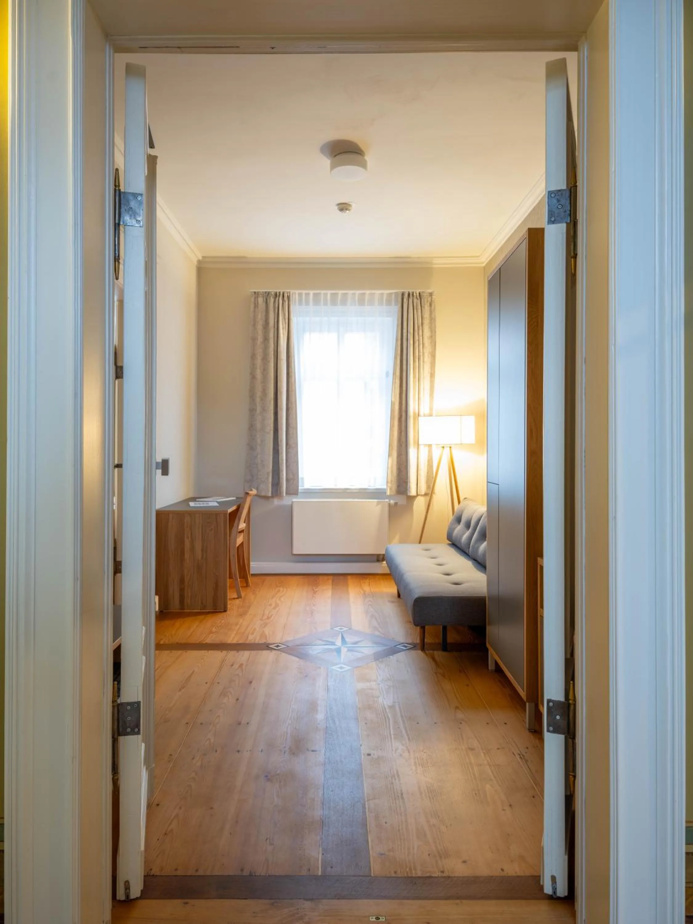 Photo of the whole room, Bed in Gästehaus Nikolai
