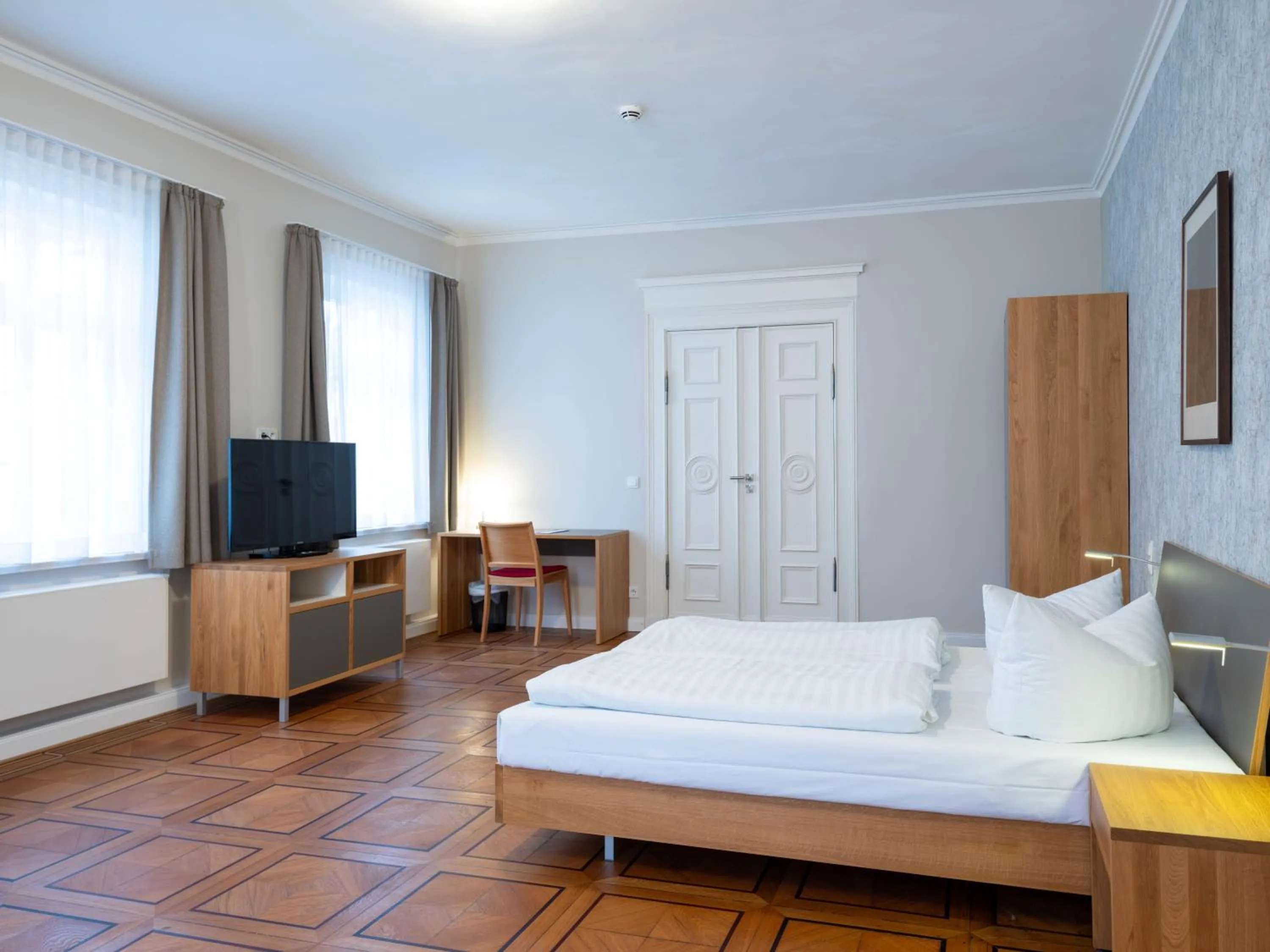 Photo of the whole room, Bed in Gästehaus Nikolai