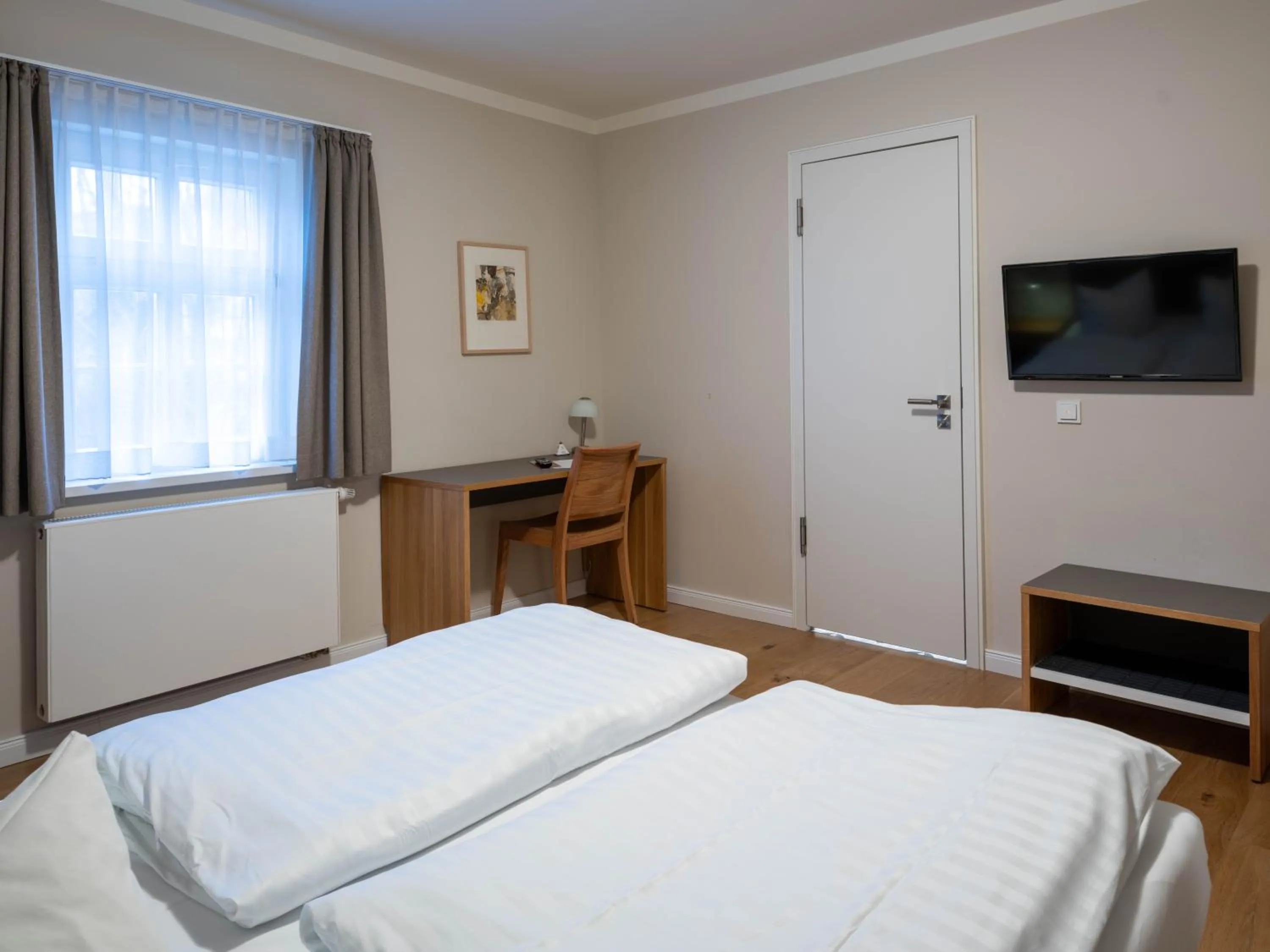 Photo of the whole room, Bed in Gästehaus Nikolai