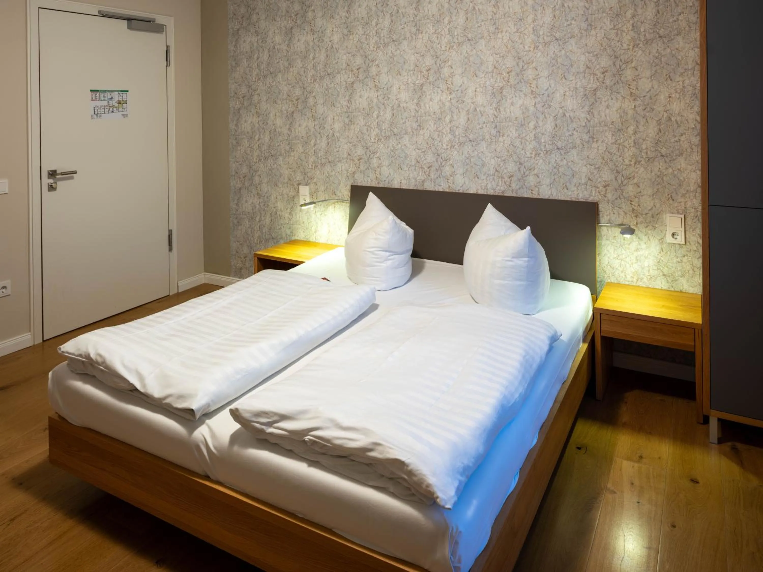 Photo of the whole room, Bed in Gästehaus Nikolai