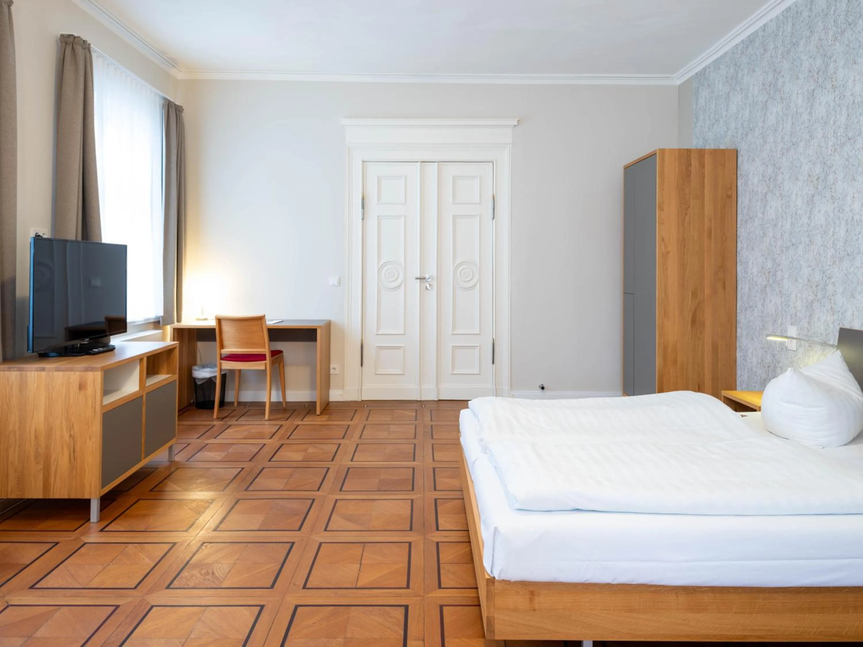 Photo of the whole room, Bed in Gästehaus Nikolai