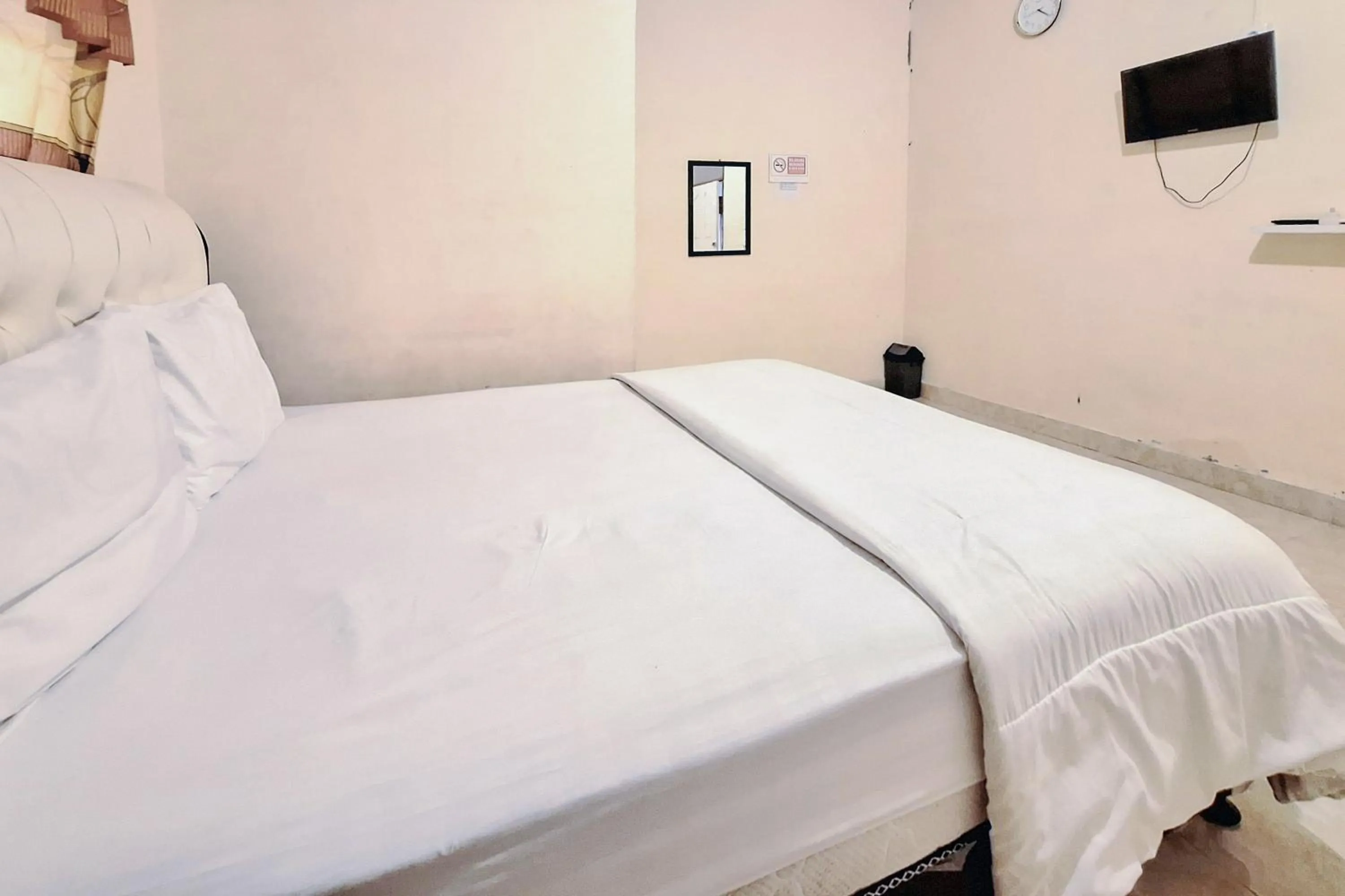 Bed in Handira Homestay Syariah Padang RedPartner