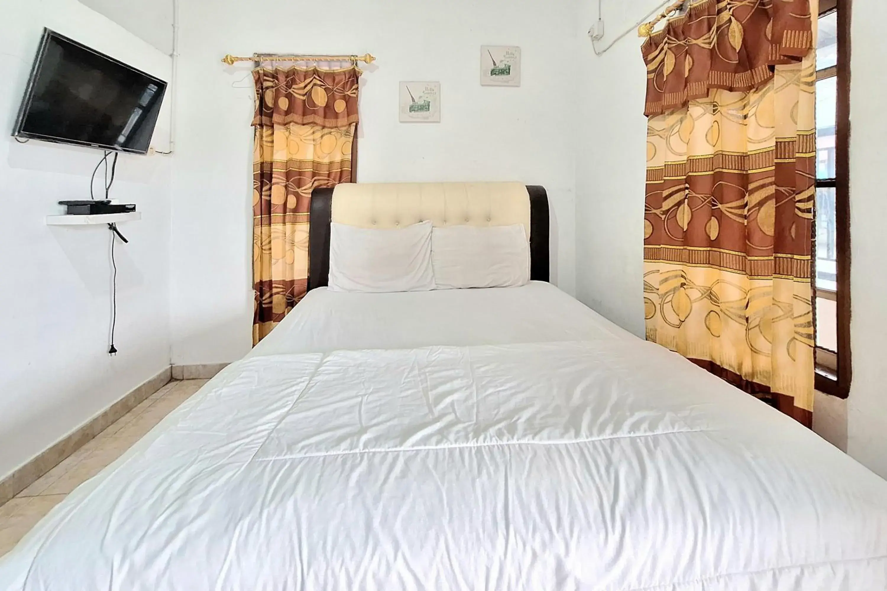 Bed in Handira Homestay Syariah Padang RedPartner Bed in Handira Homestay Syariah Padang RedPartner