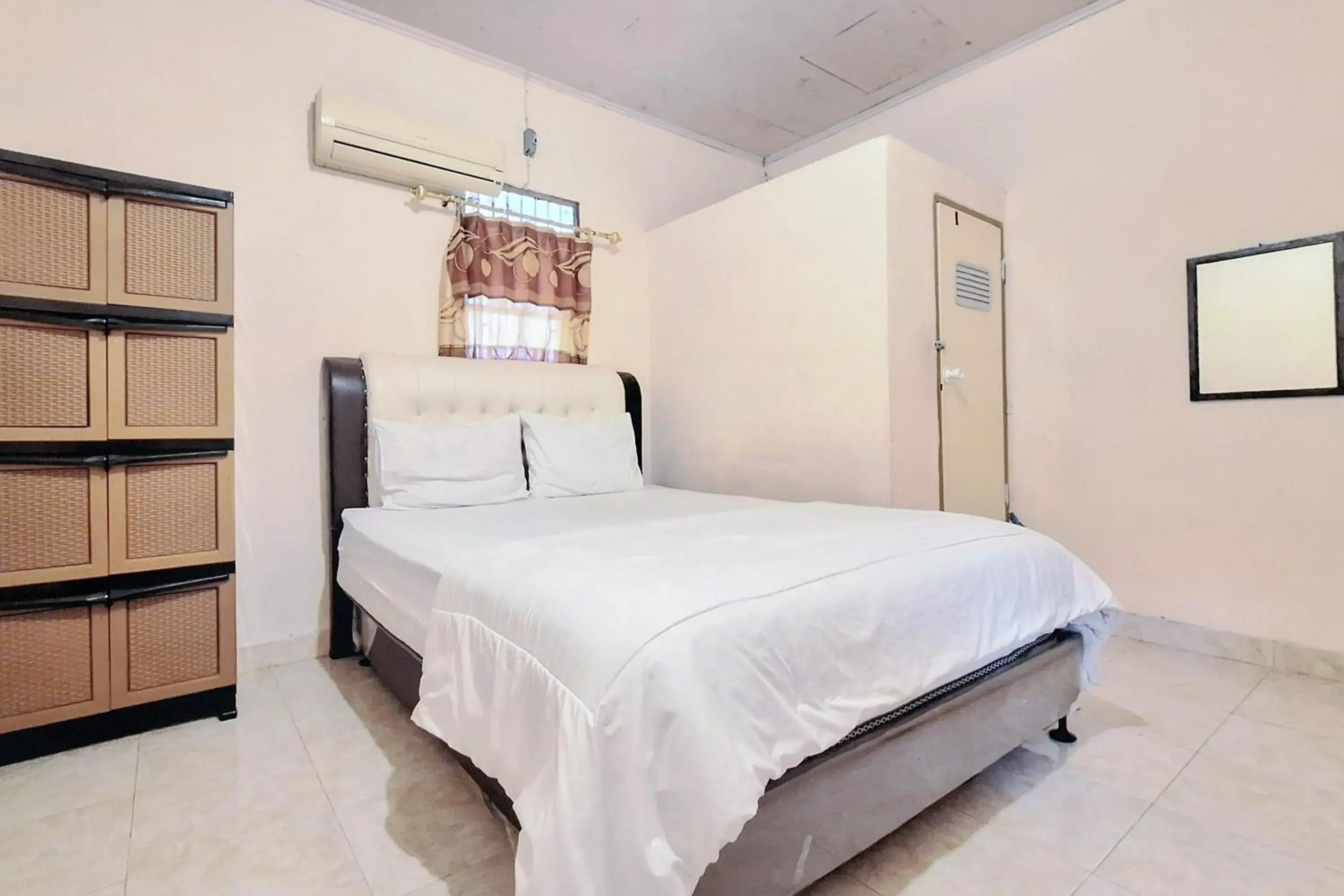 Bed in Handira Homestay Syariah Padang RedPartner Bed in Handira Homestay Syariah Padang RedPartner