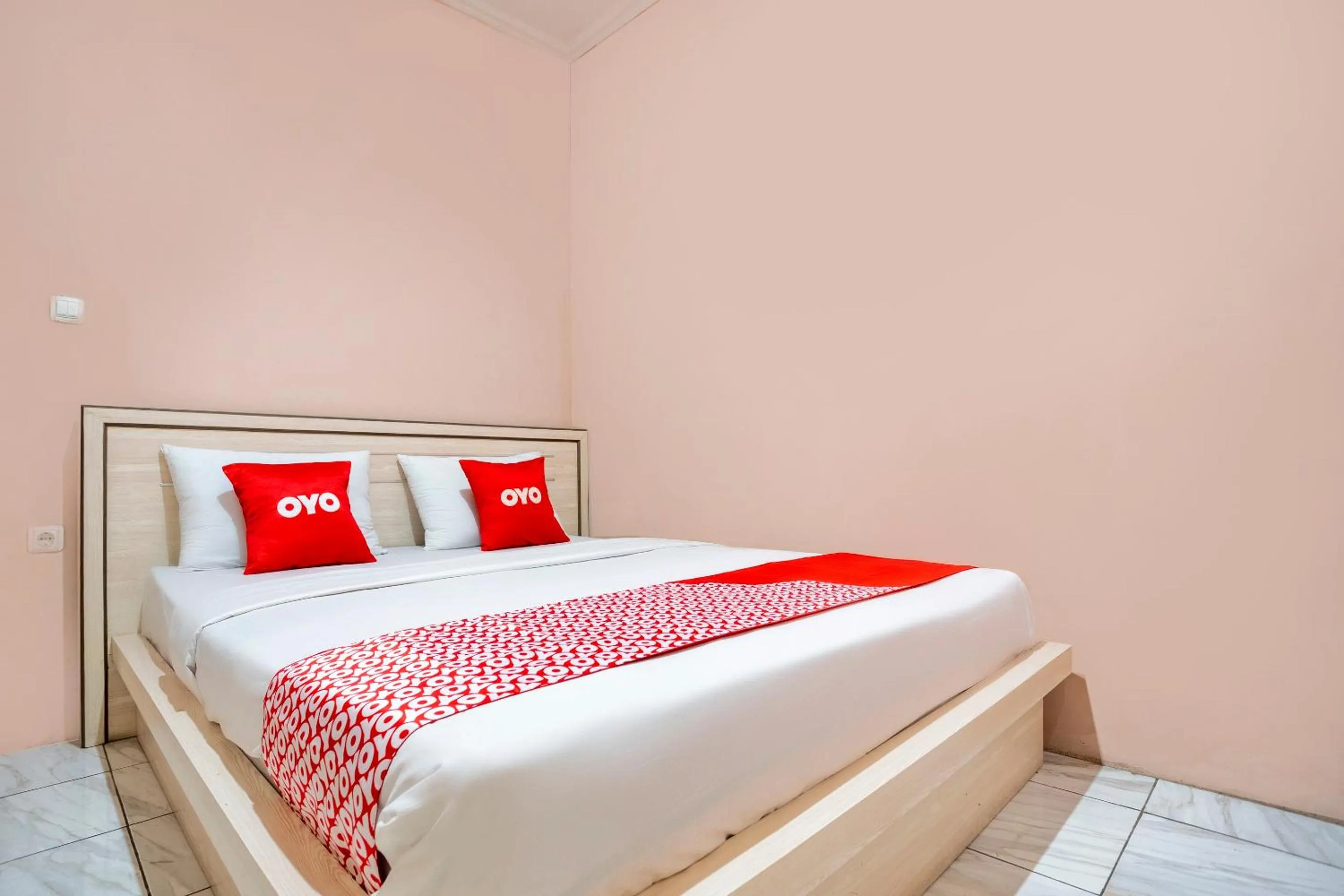 Bedroom in SPOT ON 2974 Penginapan Roma 88