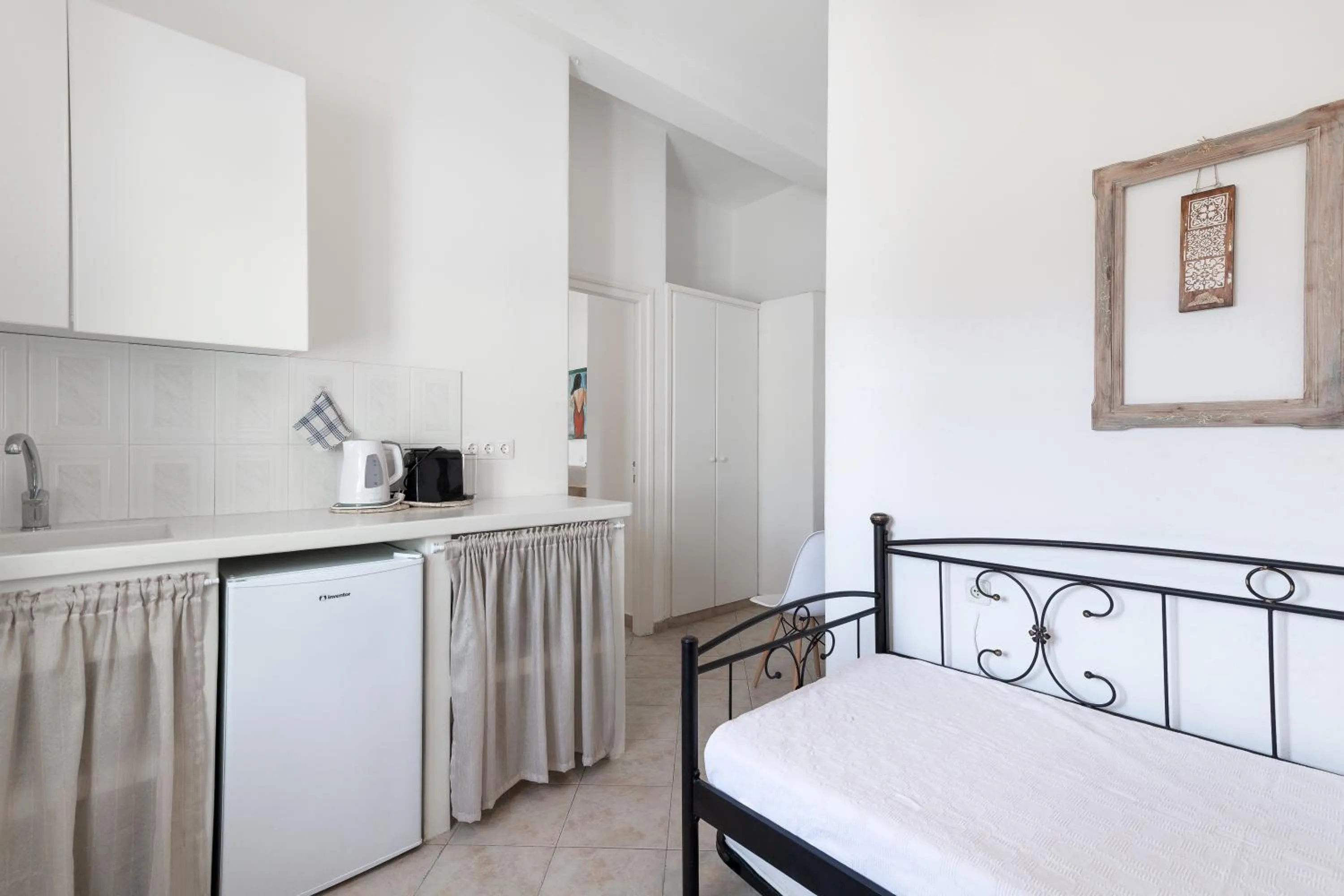 kitchen, Bed in Akteon Hotel