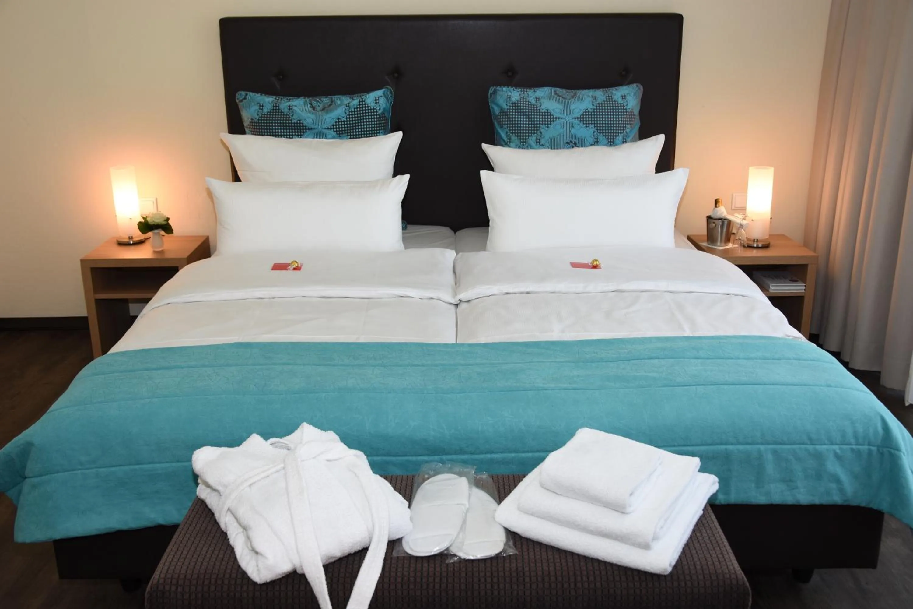 Bed in Concorde Hotel Viktoria