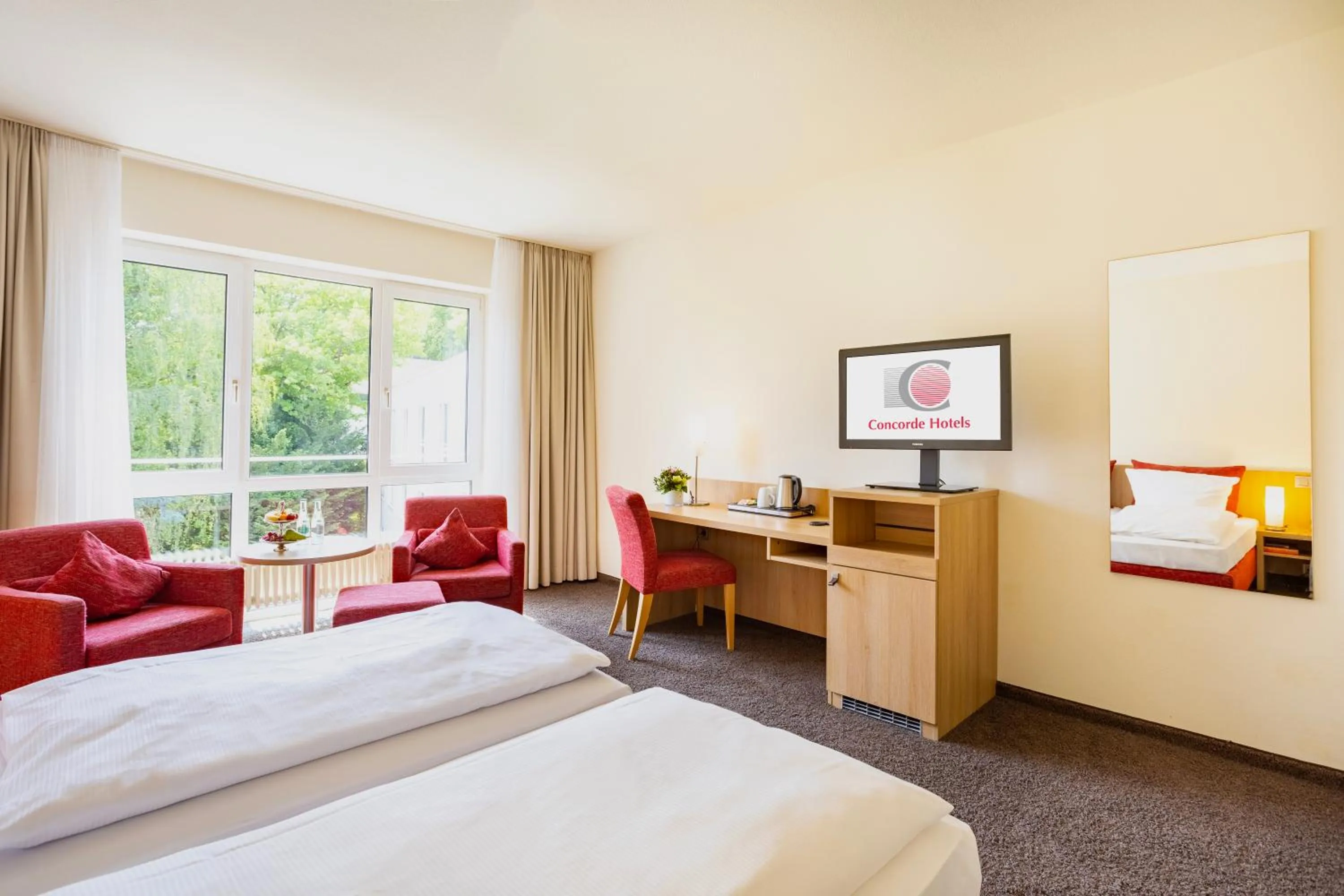 Photo of the whole room, Bed in Concorde Hotel Viktoria