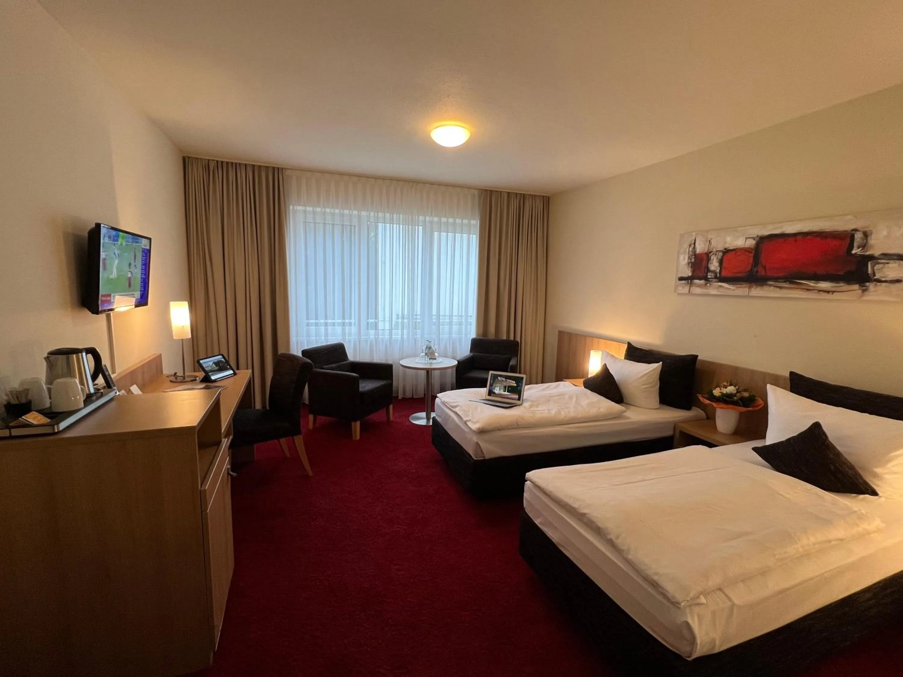 Bed in Concorde Hotel Viktoria