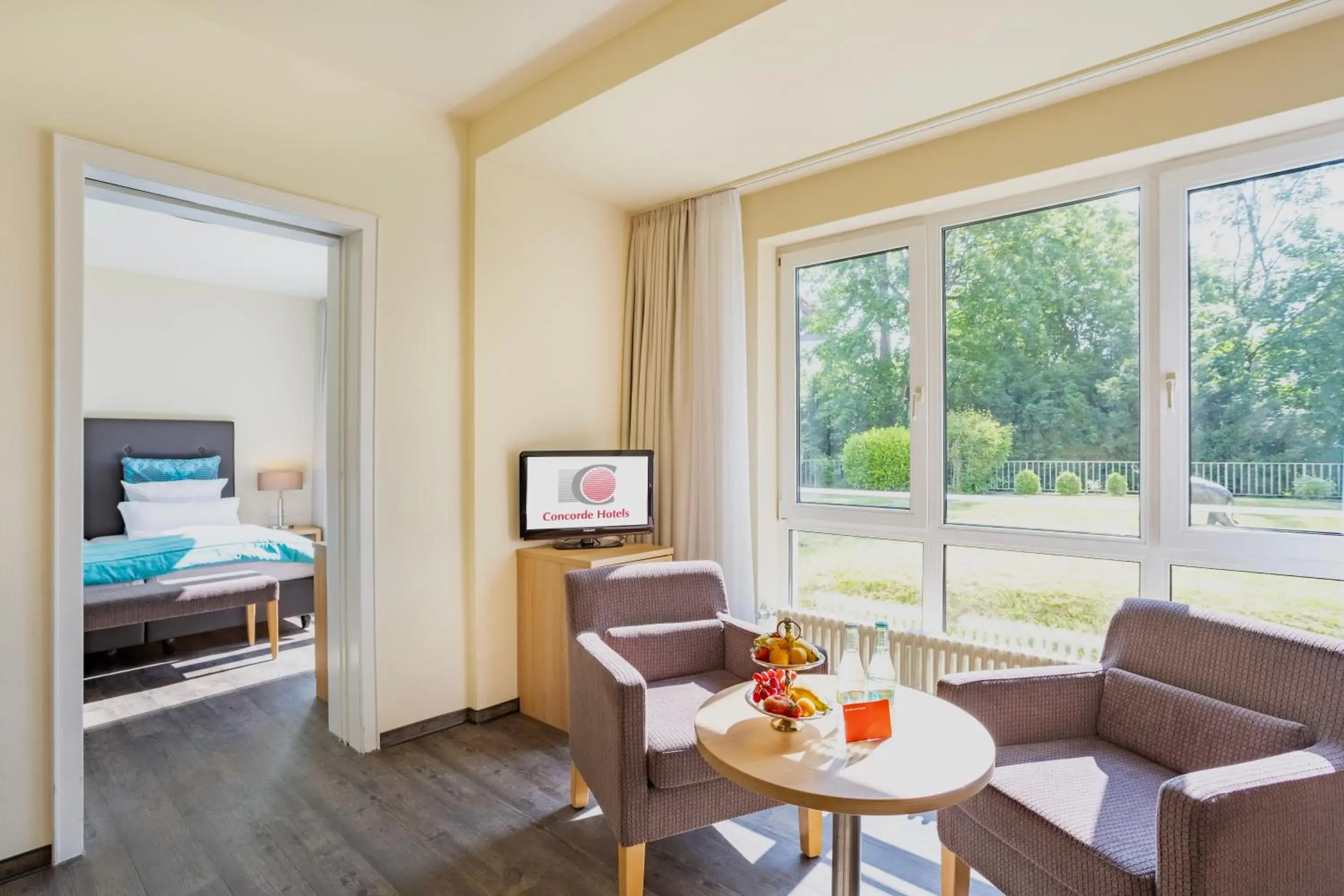 Living room, Bed in Concorde Hotel Viktoria Living room, Bed in Concorde Hotel Viktoria