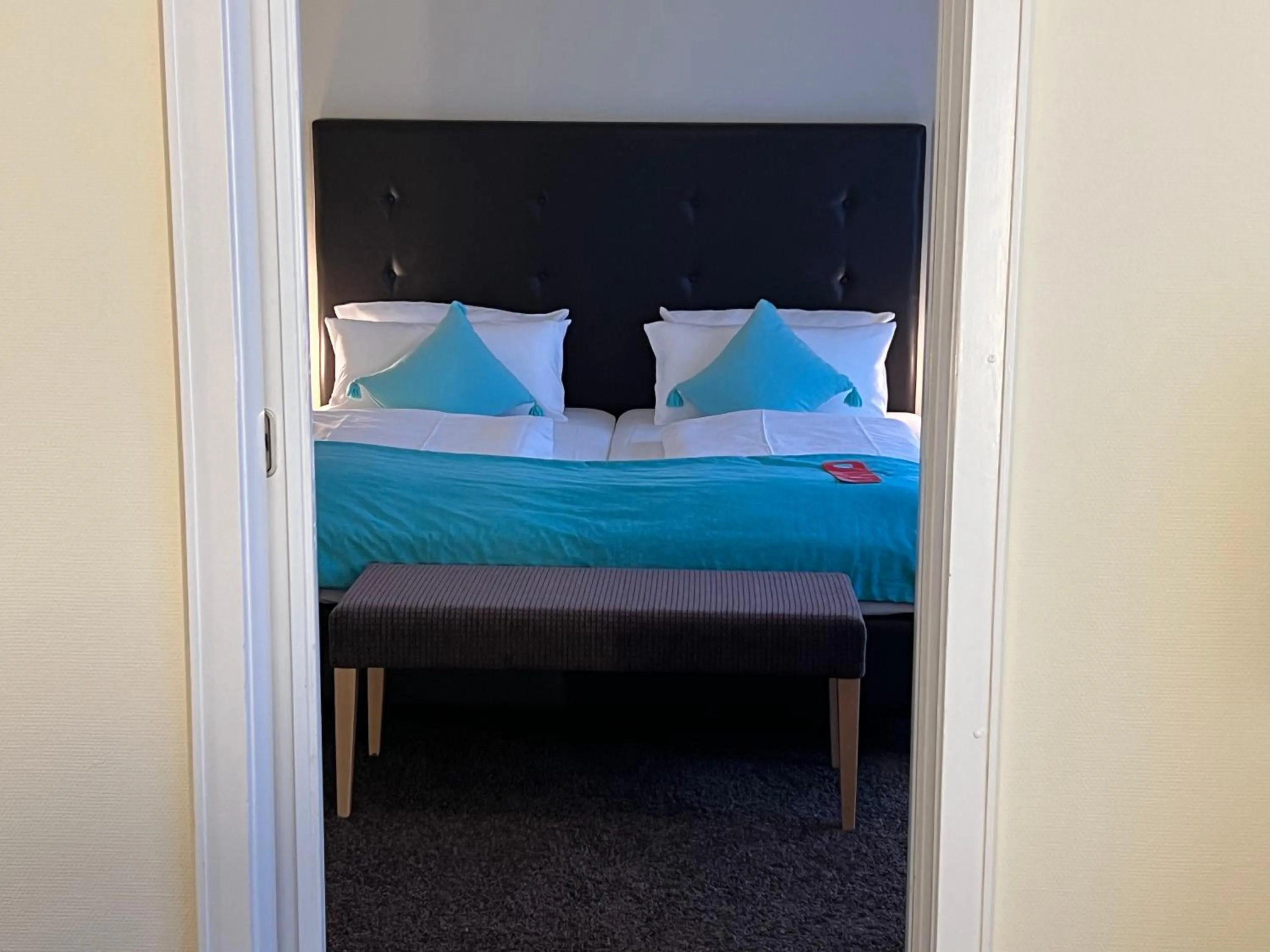 Bed in Concorde Hotel Viktoria