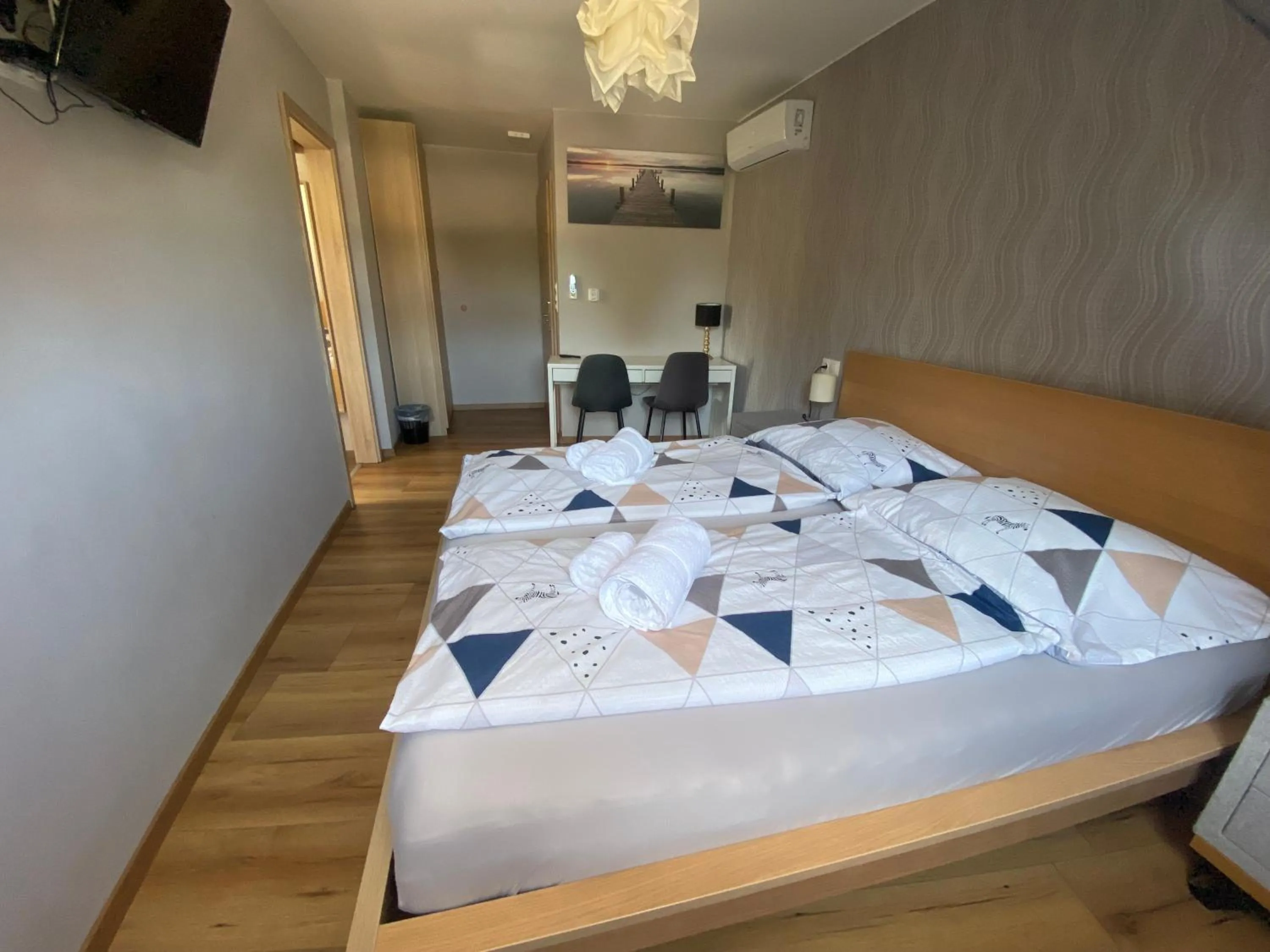 Bed in Oázis Panzió