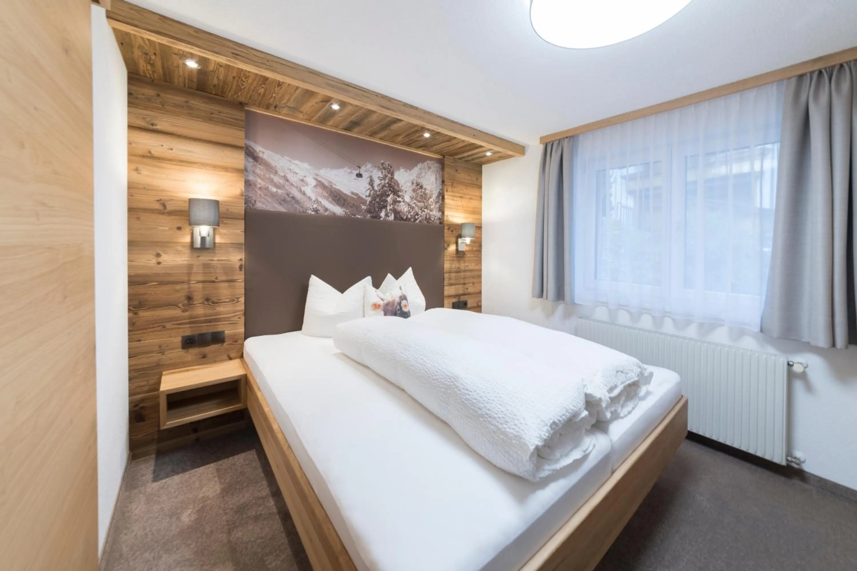 Bed in Apart Garni Sesvenna