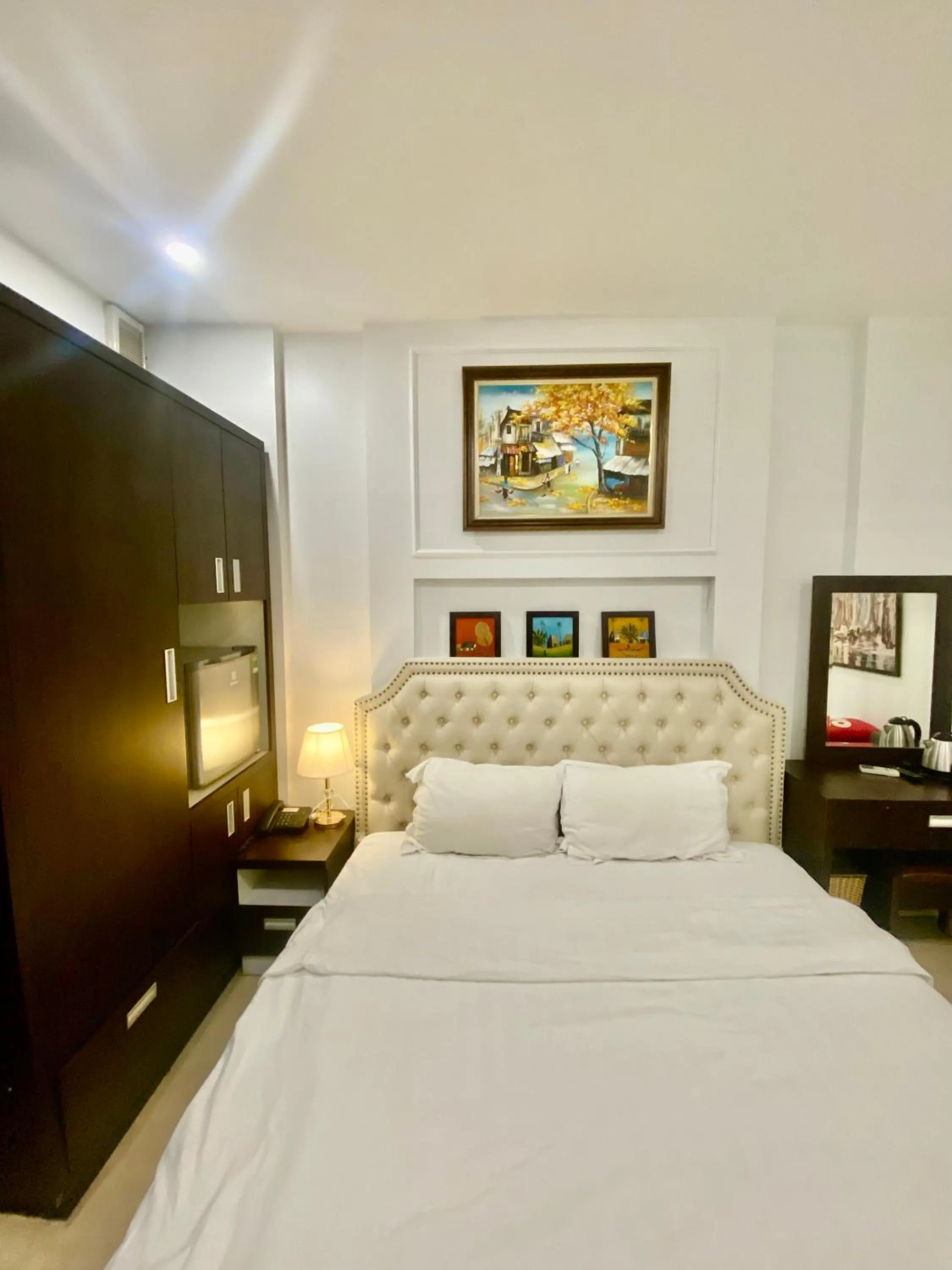 Bed in Chariot Hotel