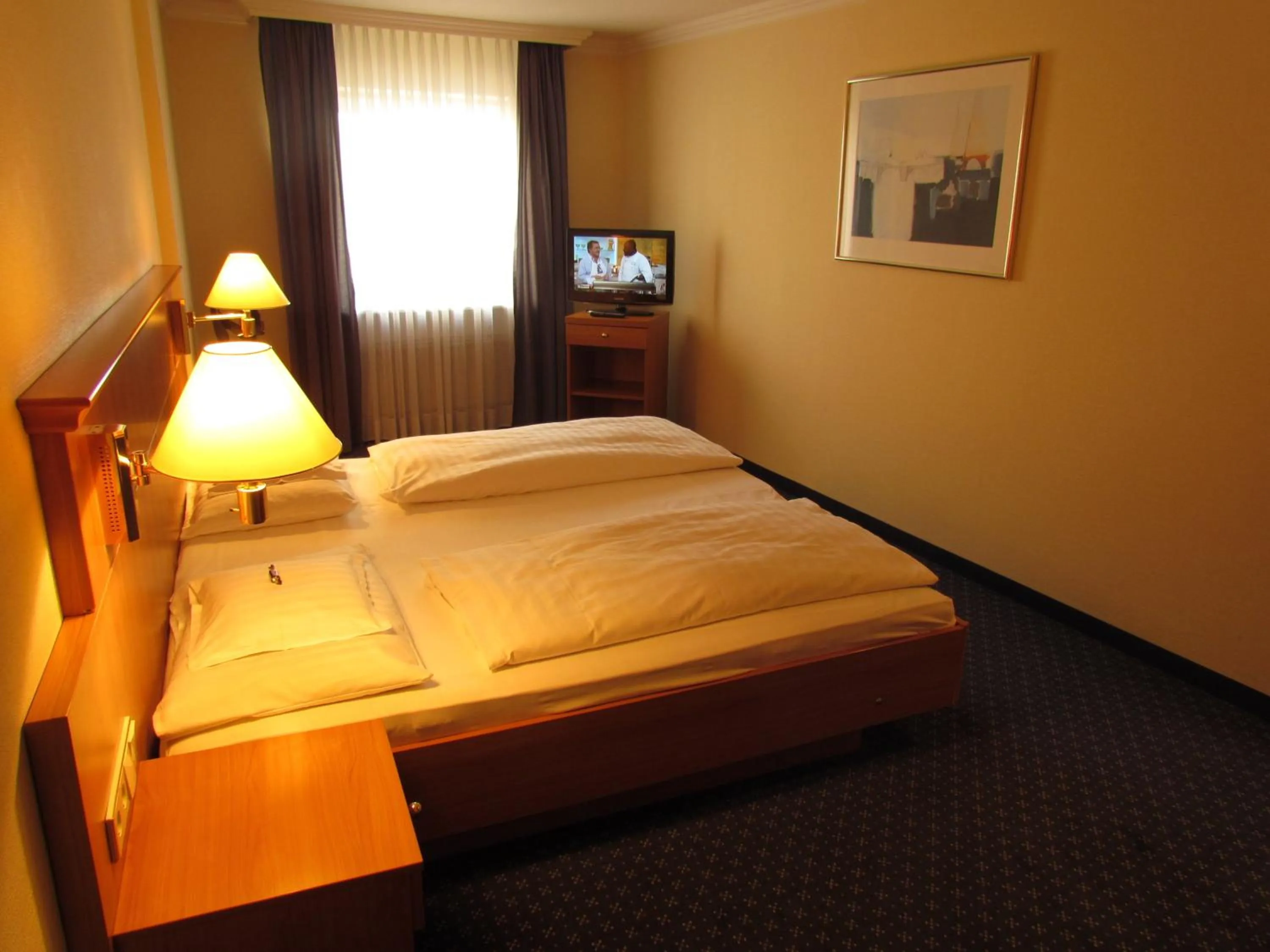 Bed in Parkhotel Bad Homburg