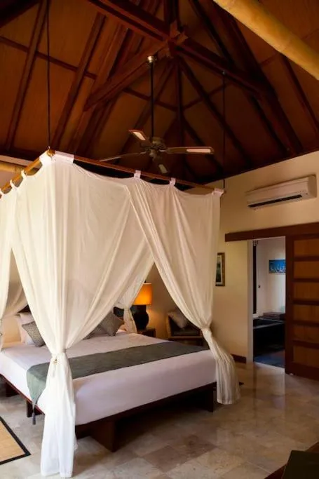 Bedroom, Bed in Mango Tree Villas Jimbaran Bali