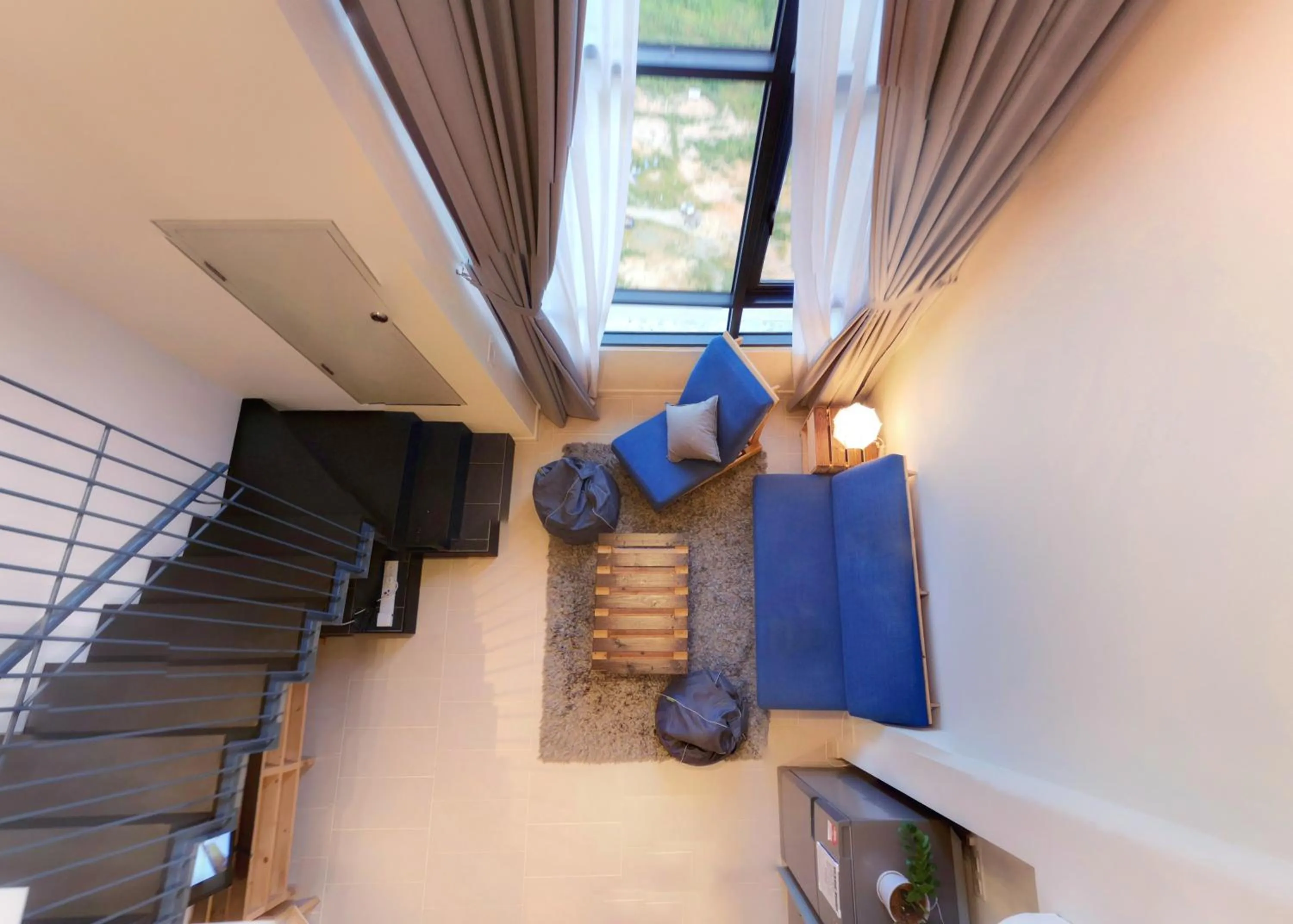 Living room in Tamarind Suites by BeeStay Management