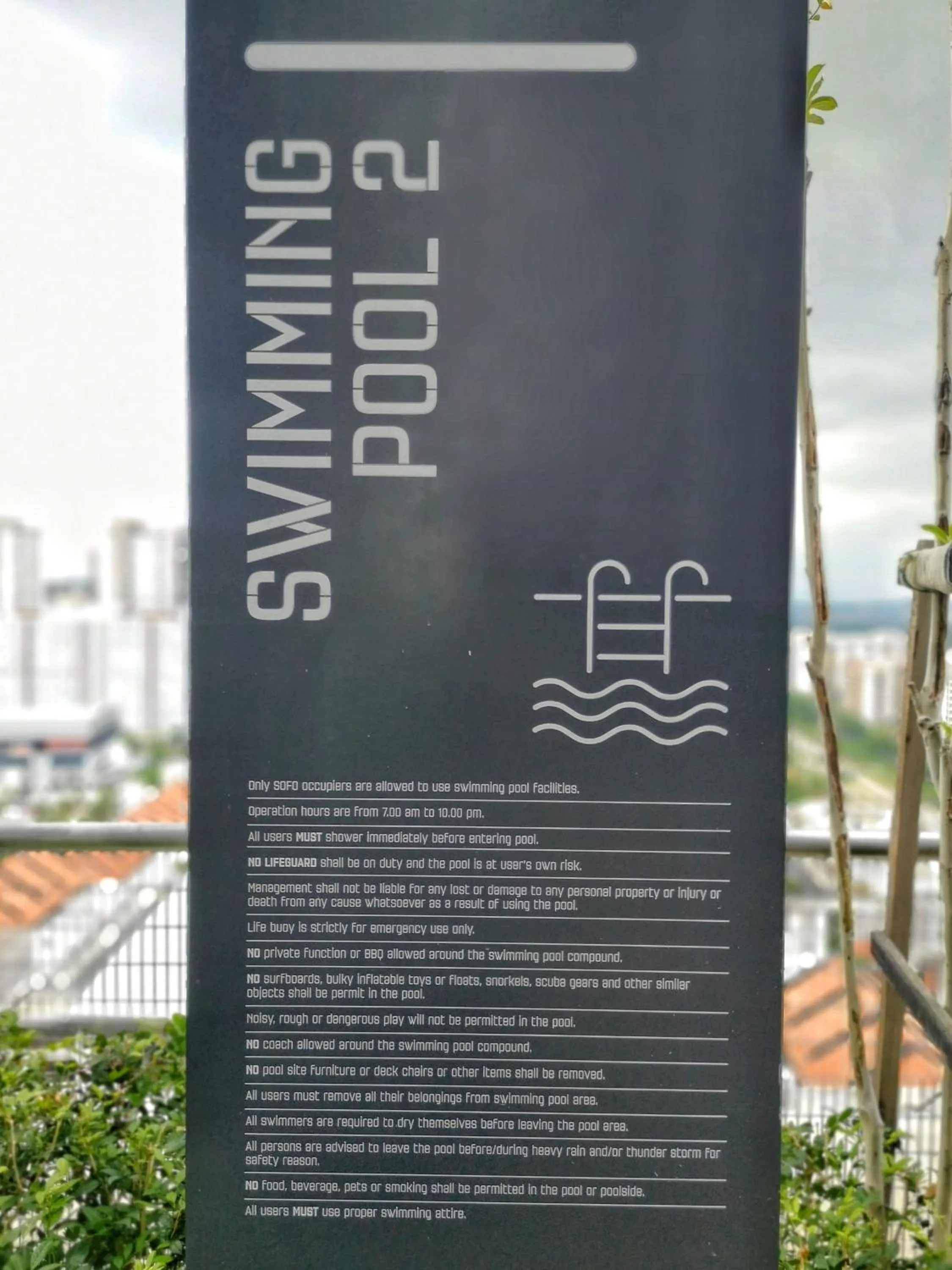 Swimming pool in Tamarind Suites by BeeStay Management