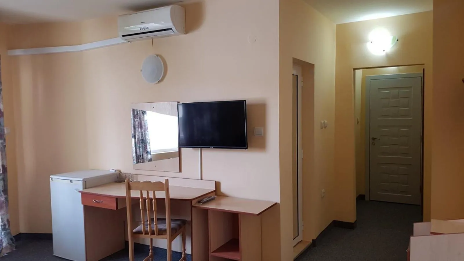 Communal lounge/ TV room in Krasi Hotel