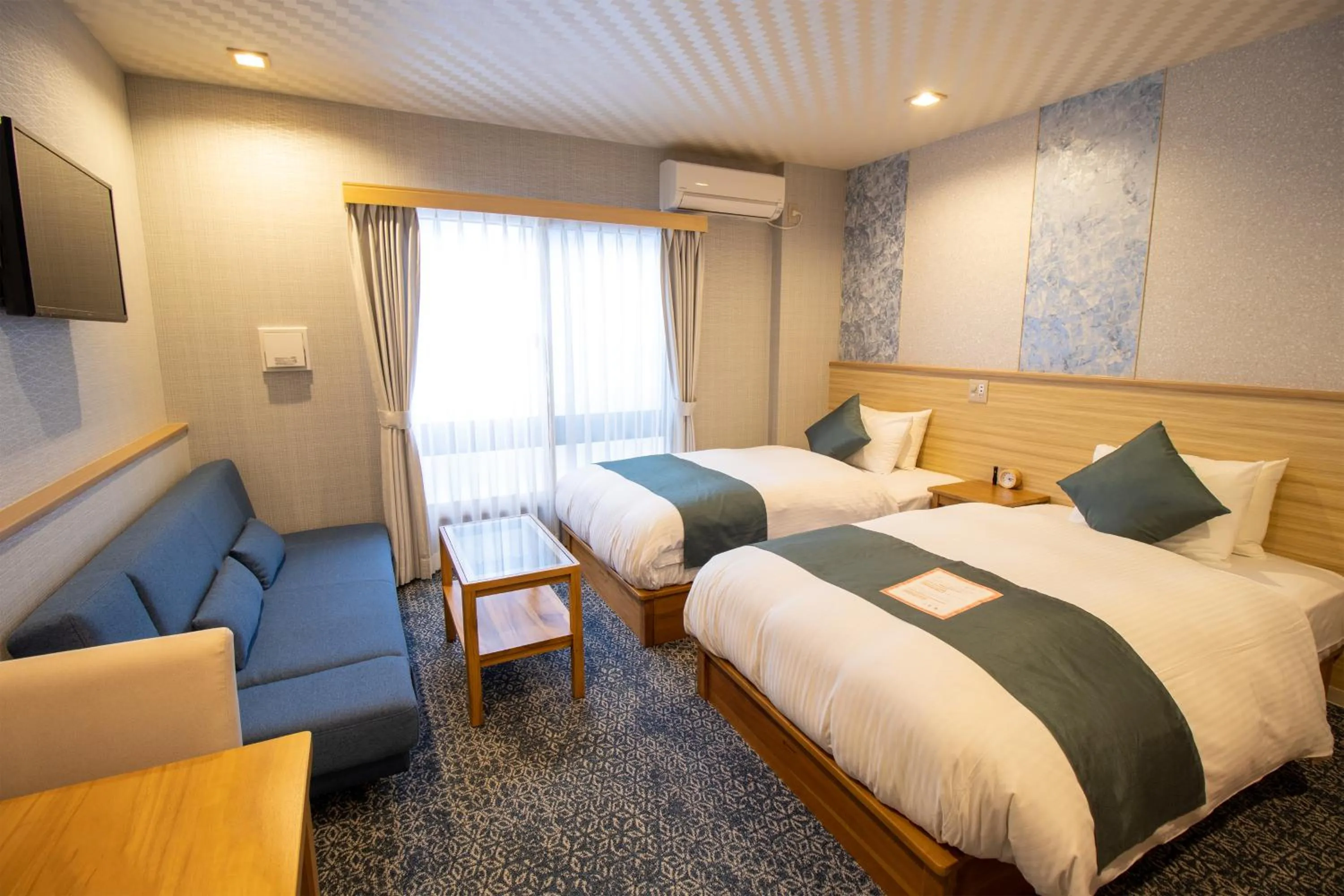 Bed in Stay SAKURA Kyoto Tambaguchi