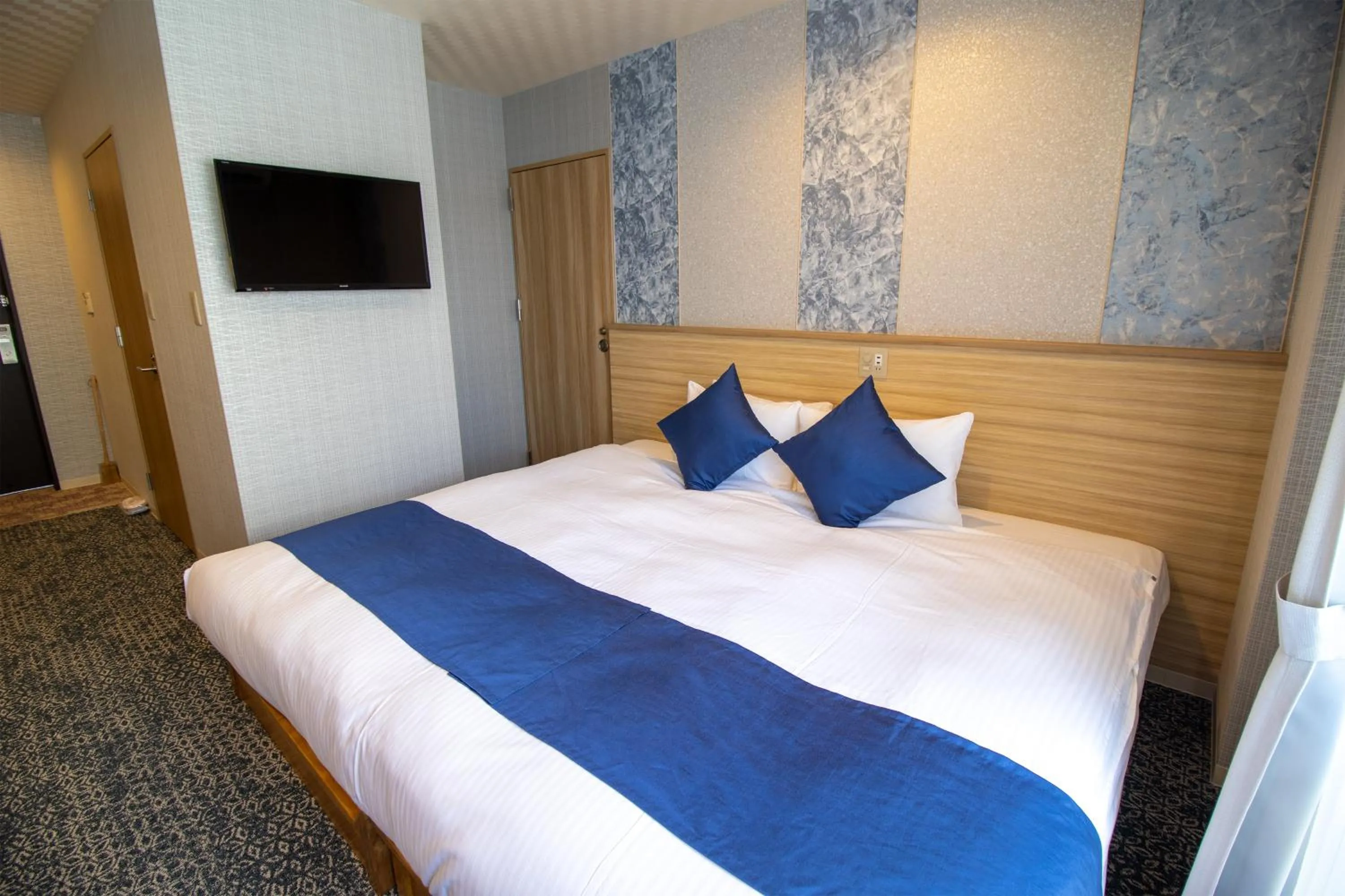 Bed in Stay SAKURA Kyoto Tambaguchi