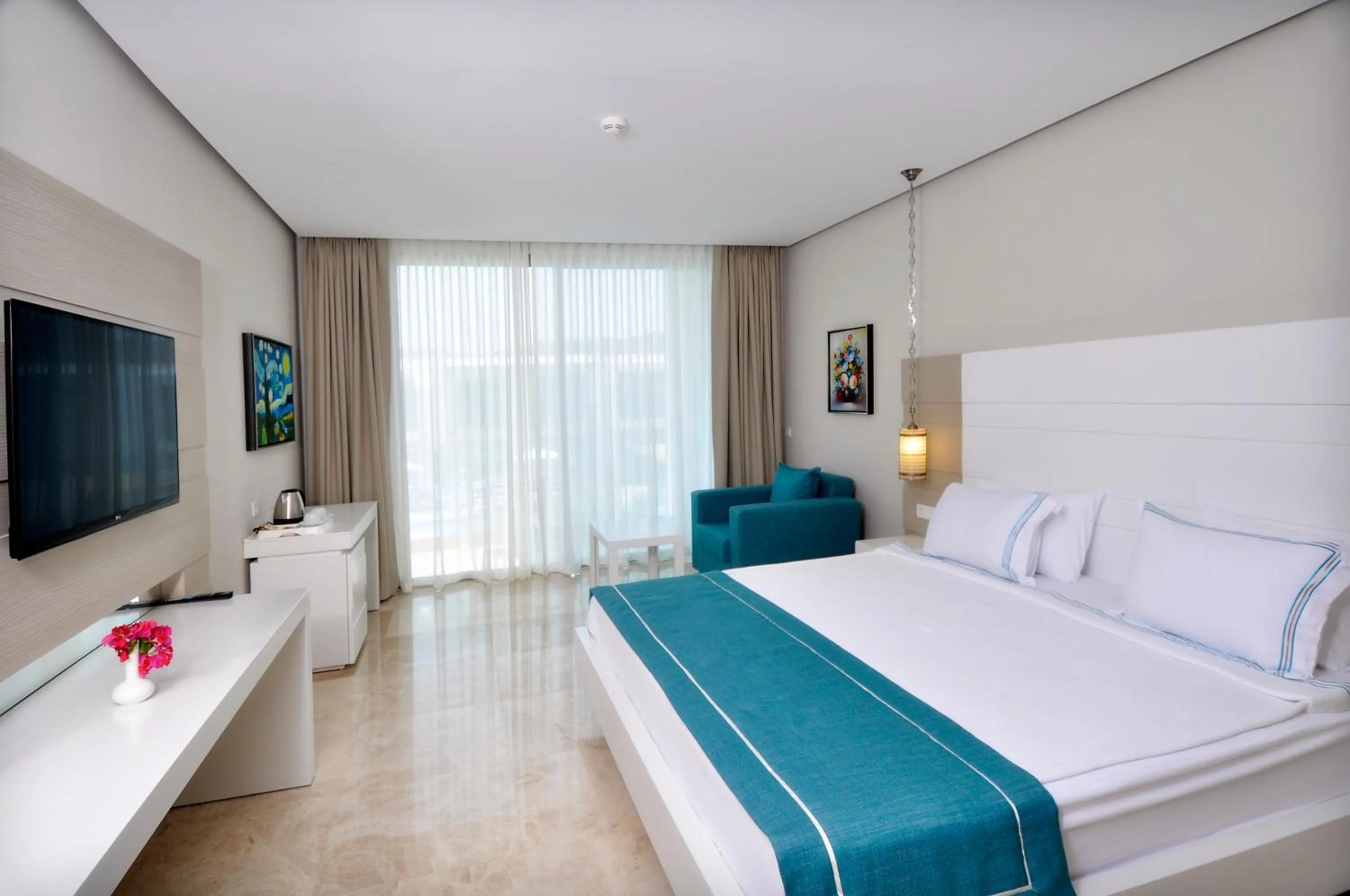 Photo of the whole room, Bed in Lugga Boutique Hotel & Beach