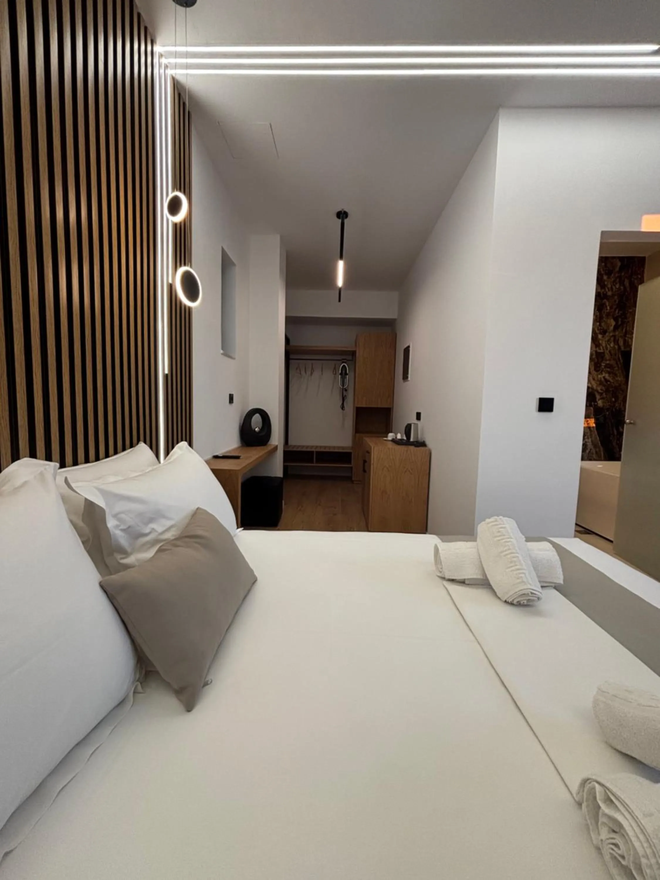 Bed in Ampoulos Rooms & Apartments