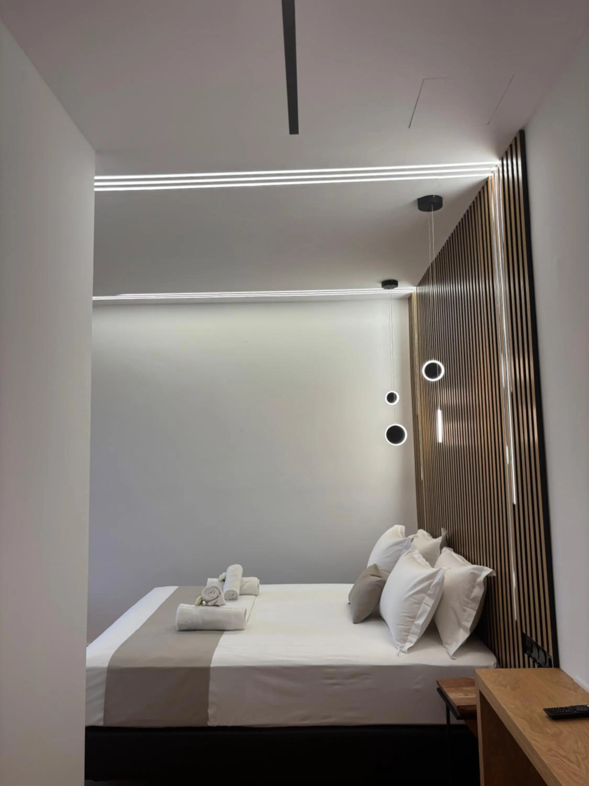 Bed in Ampoulos Rooms & Apartments