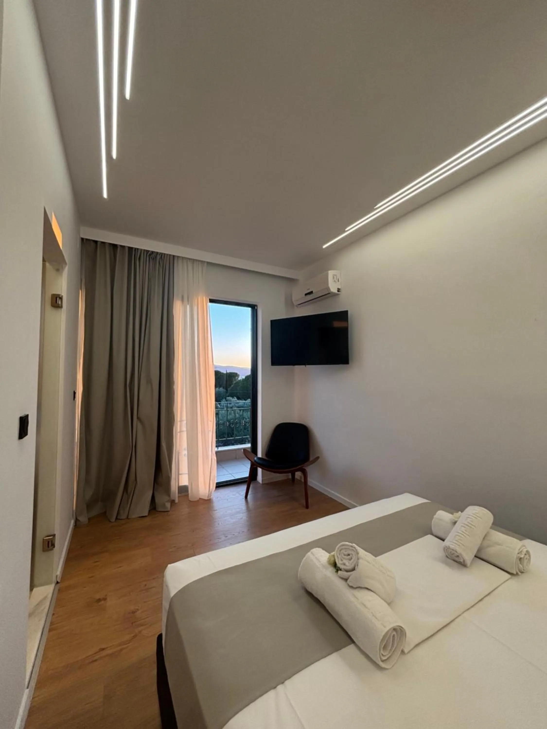 Bed in Ampoulos Rooms & Apartments