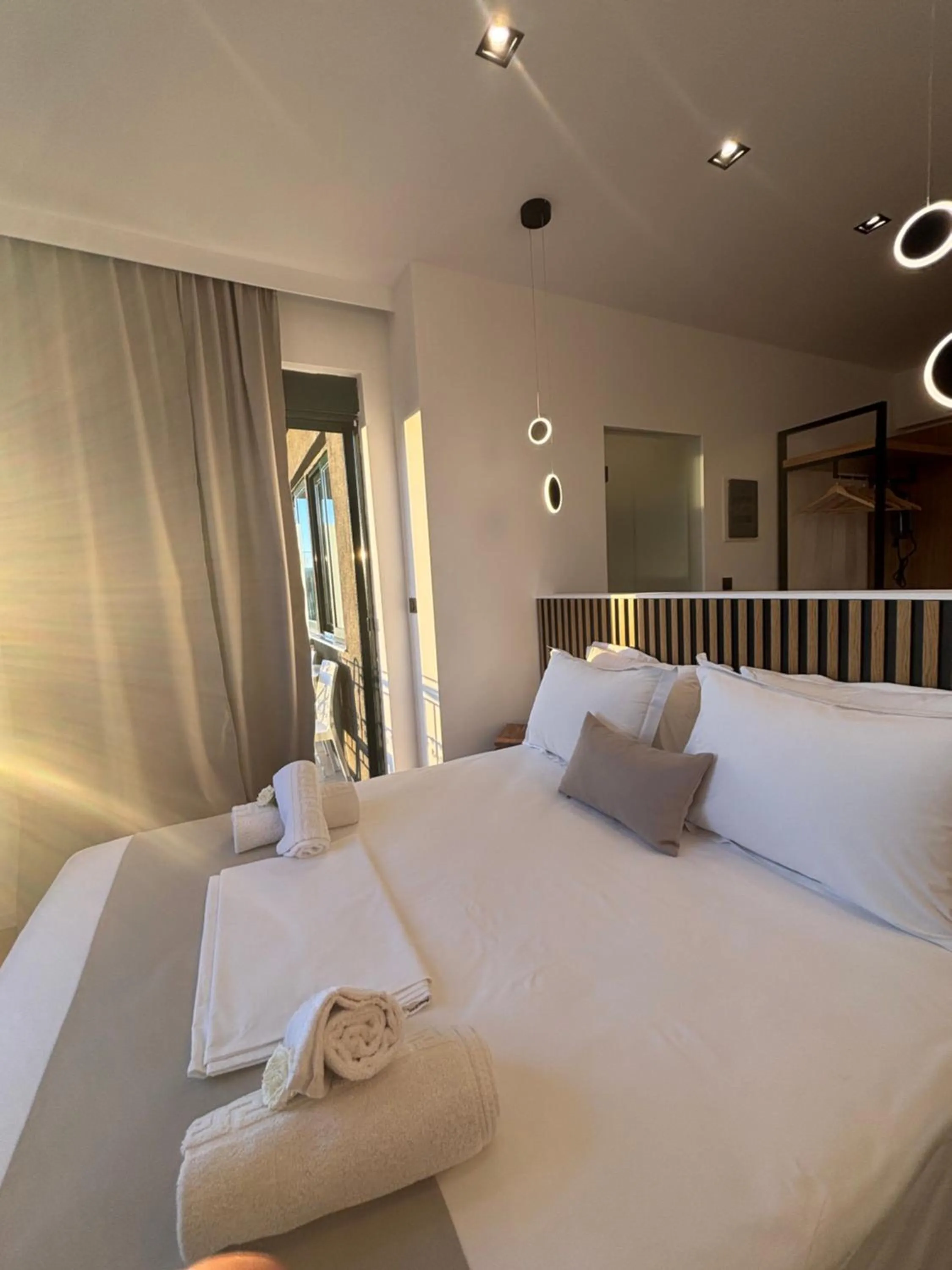 Bed in Ampoulos Rooms & Apartments