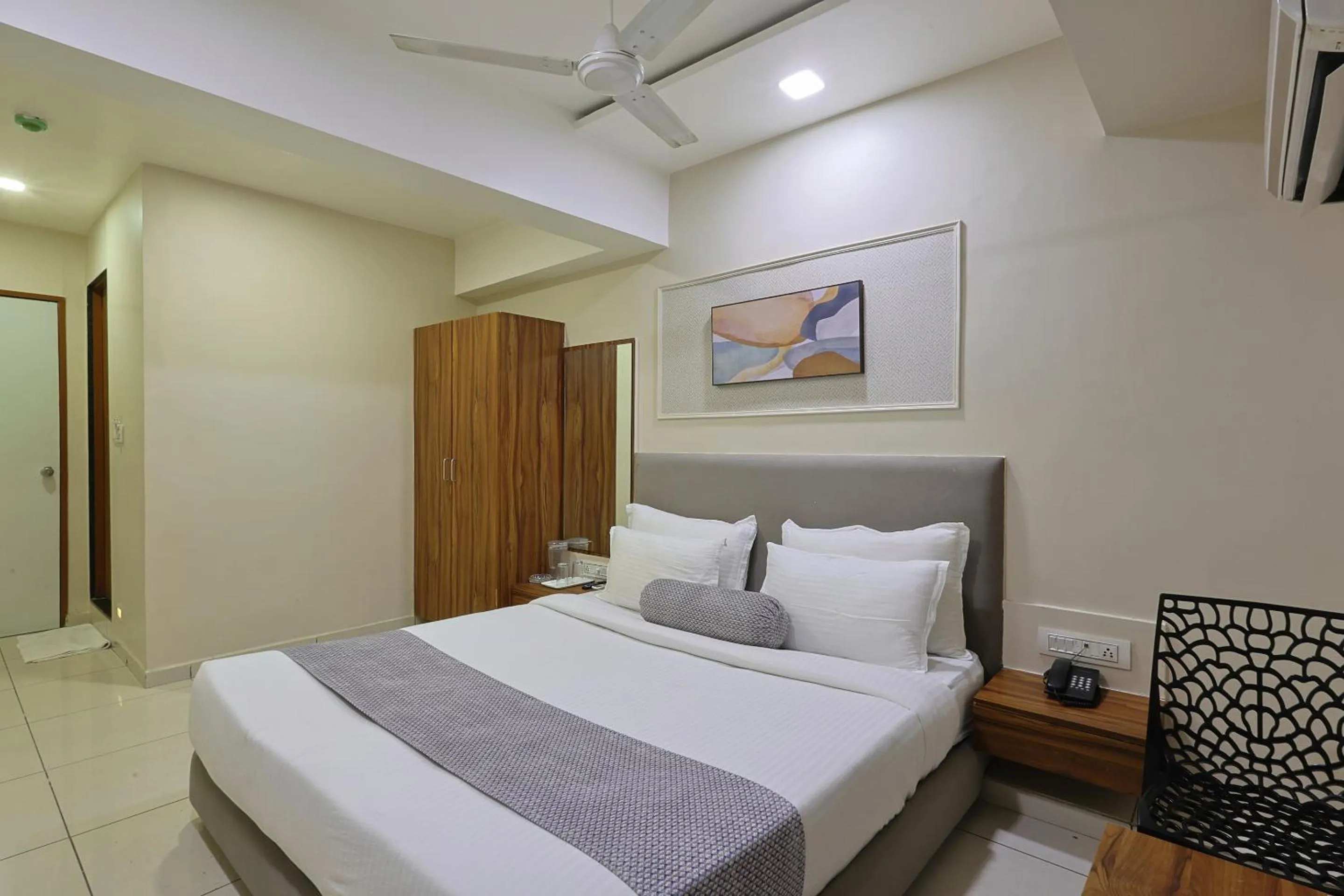 Bed in HOTEL SHALIGRAM