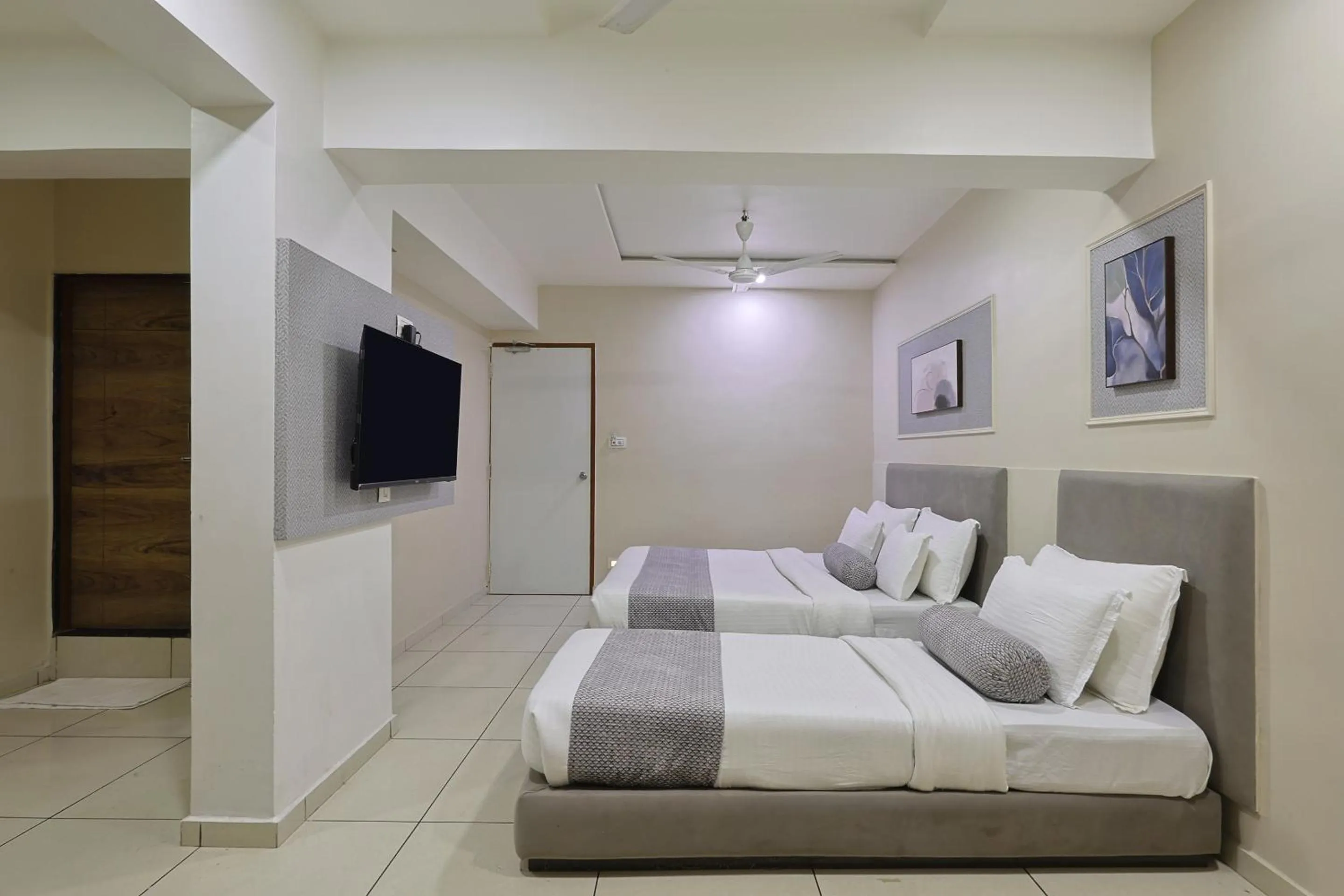 Bed in HOTEL SHALIGRAM