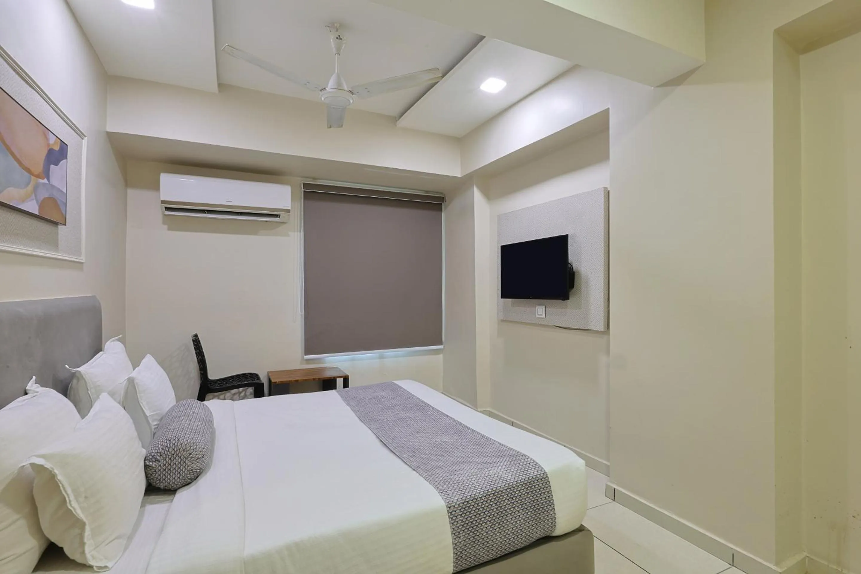 Bed in HOTEL SHALIGRAM