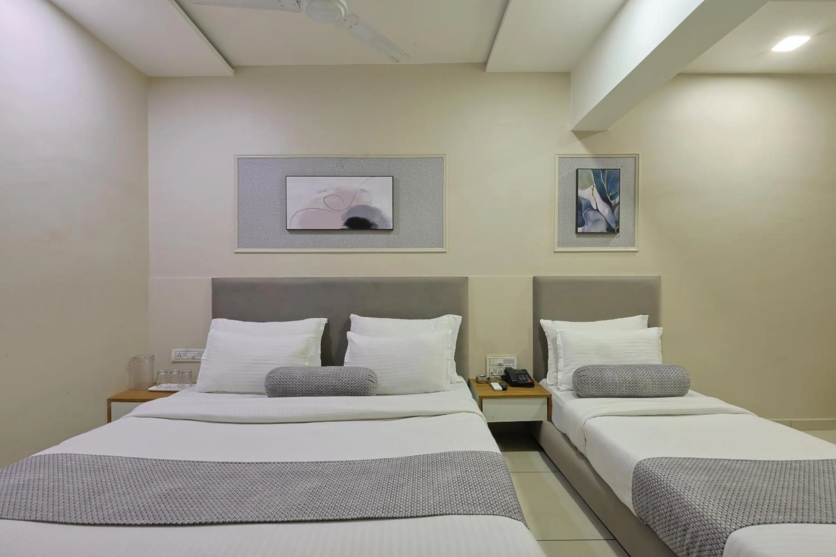 Bed in HOTEL SHALIGRAM