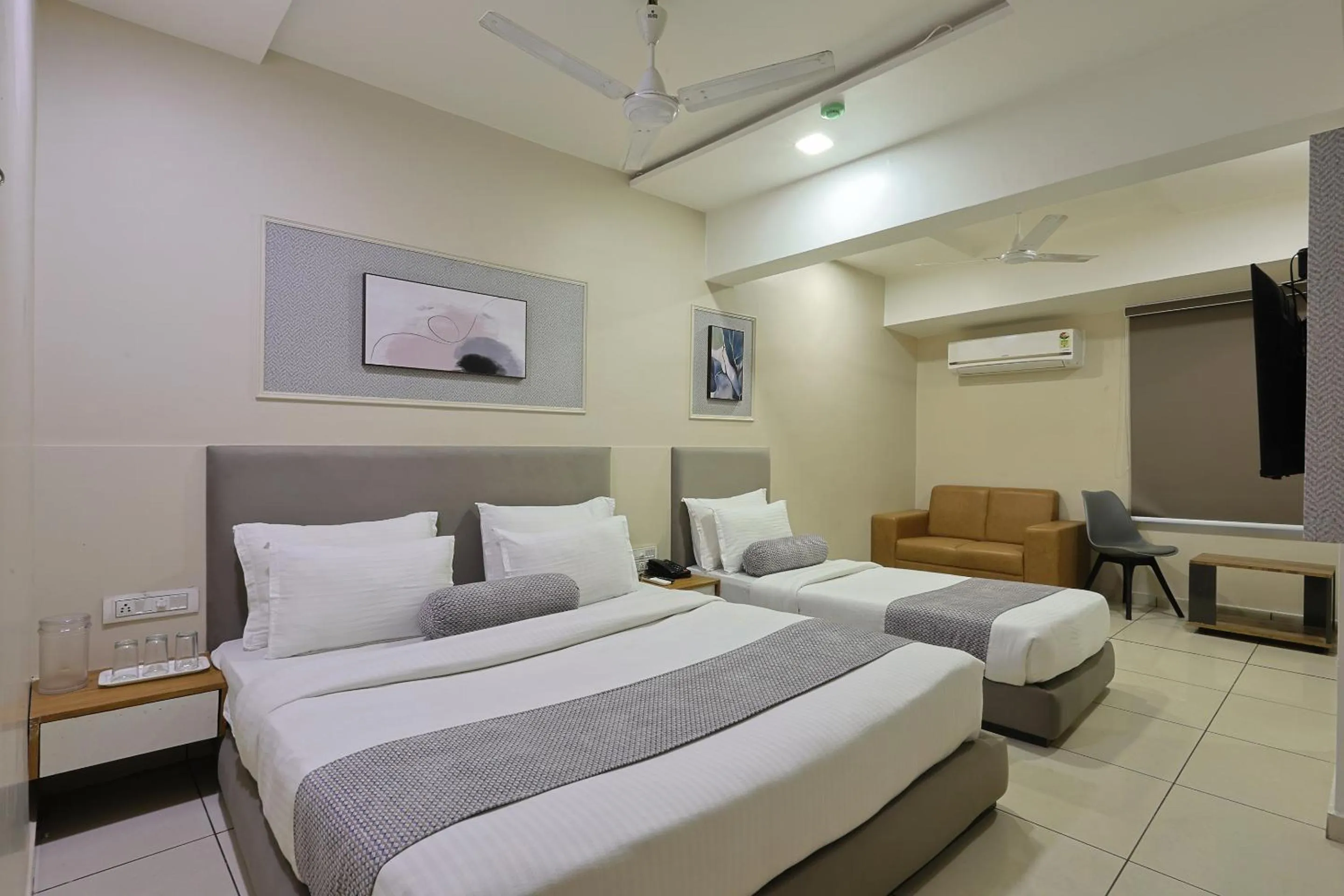 Bed in HOTEL SHALIGRAM