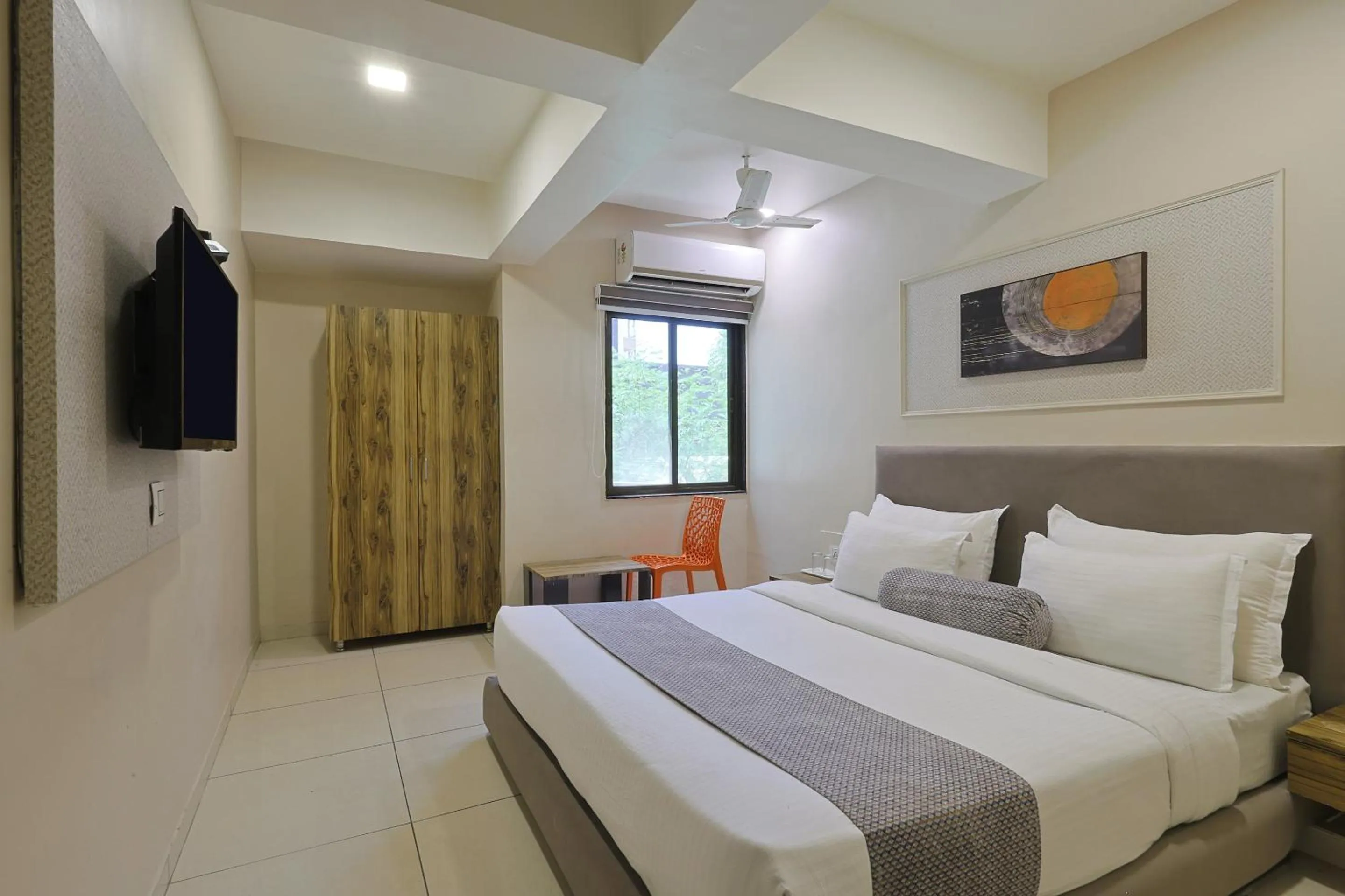 Bed in HOTEL SHALIGRAM