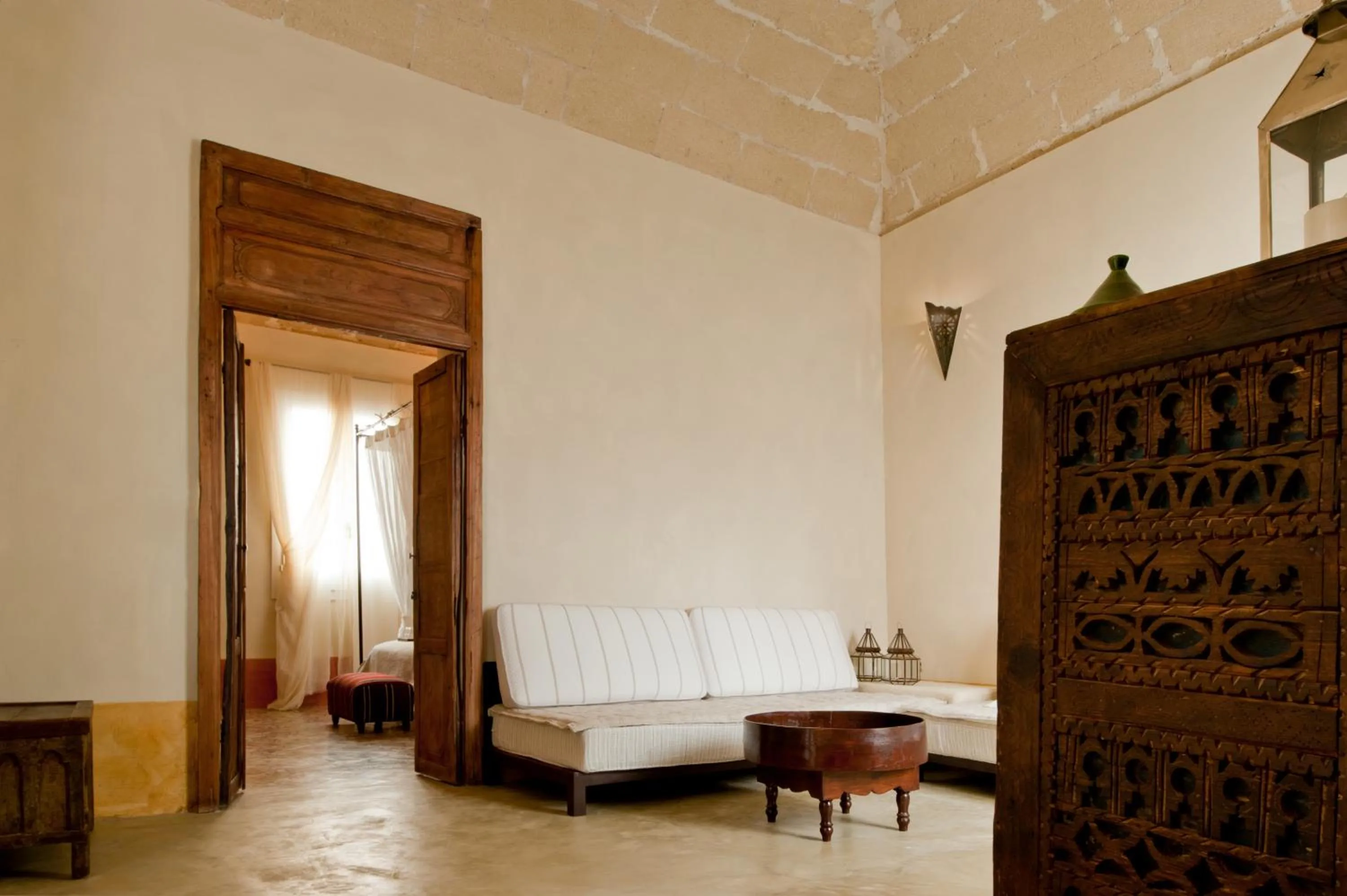 Living room, Bed in La Casa Dell'Arancio