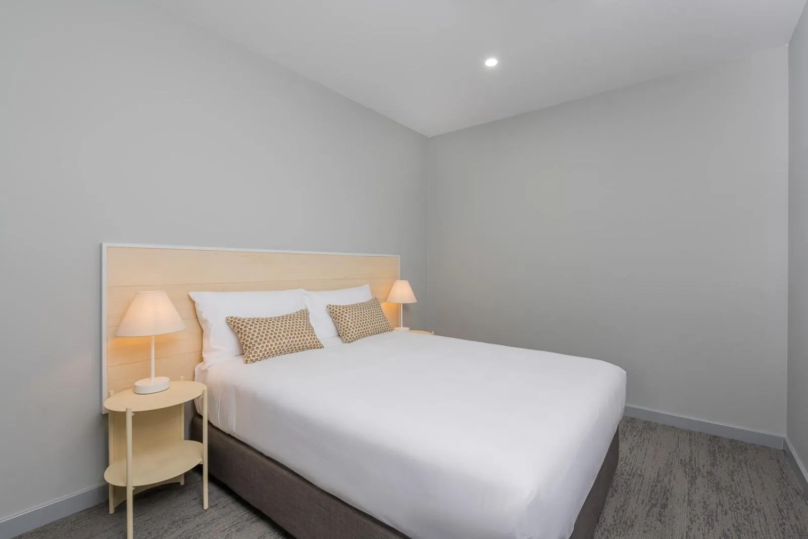 Bed in Abode Malua Bay